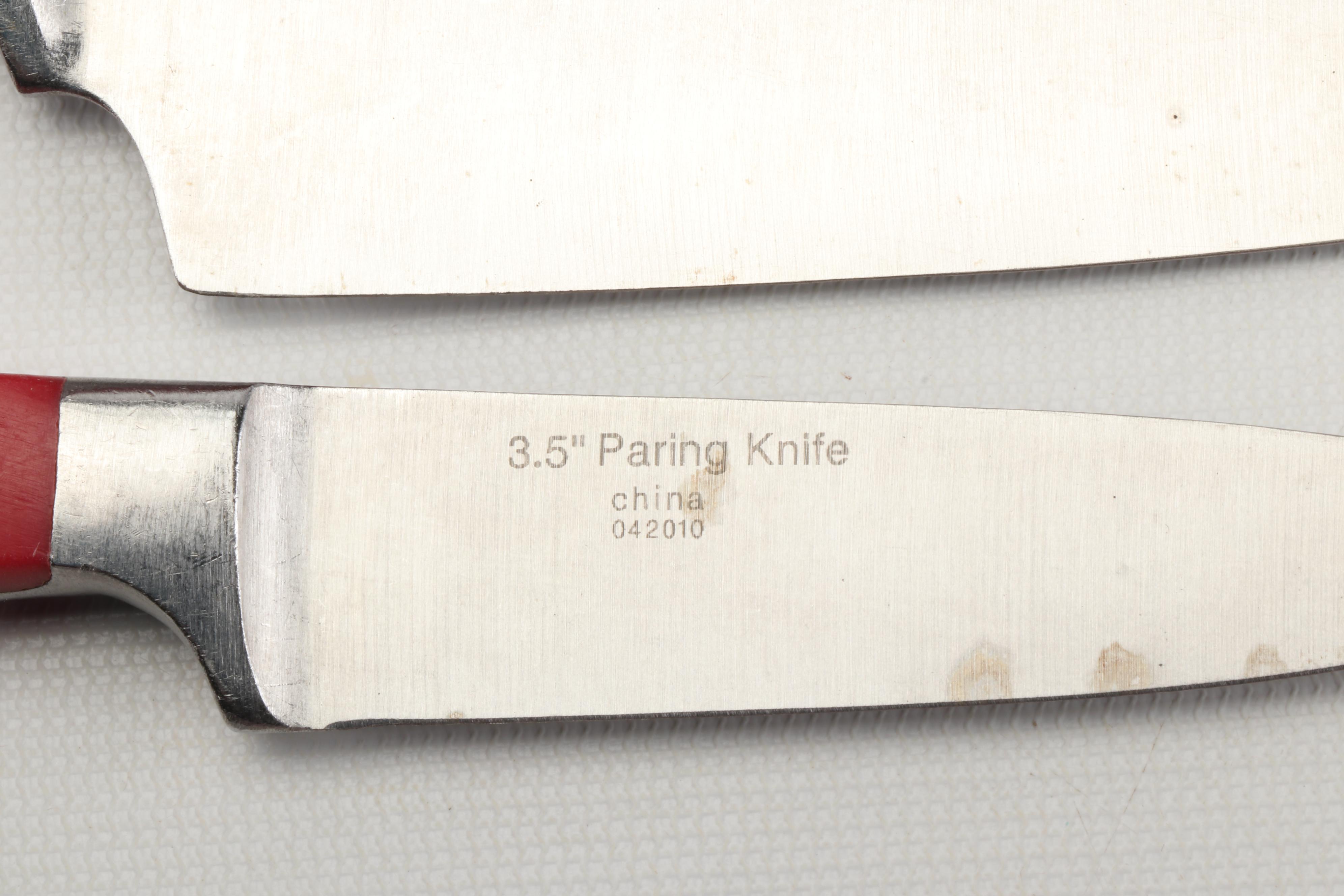 Emile Henry Dutch Oven with Wolfgang Puck Dinnerware and Assorted Cutlery