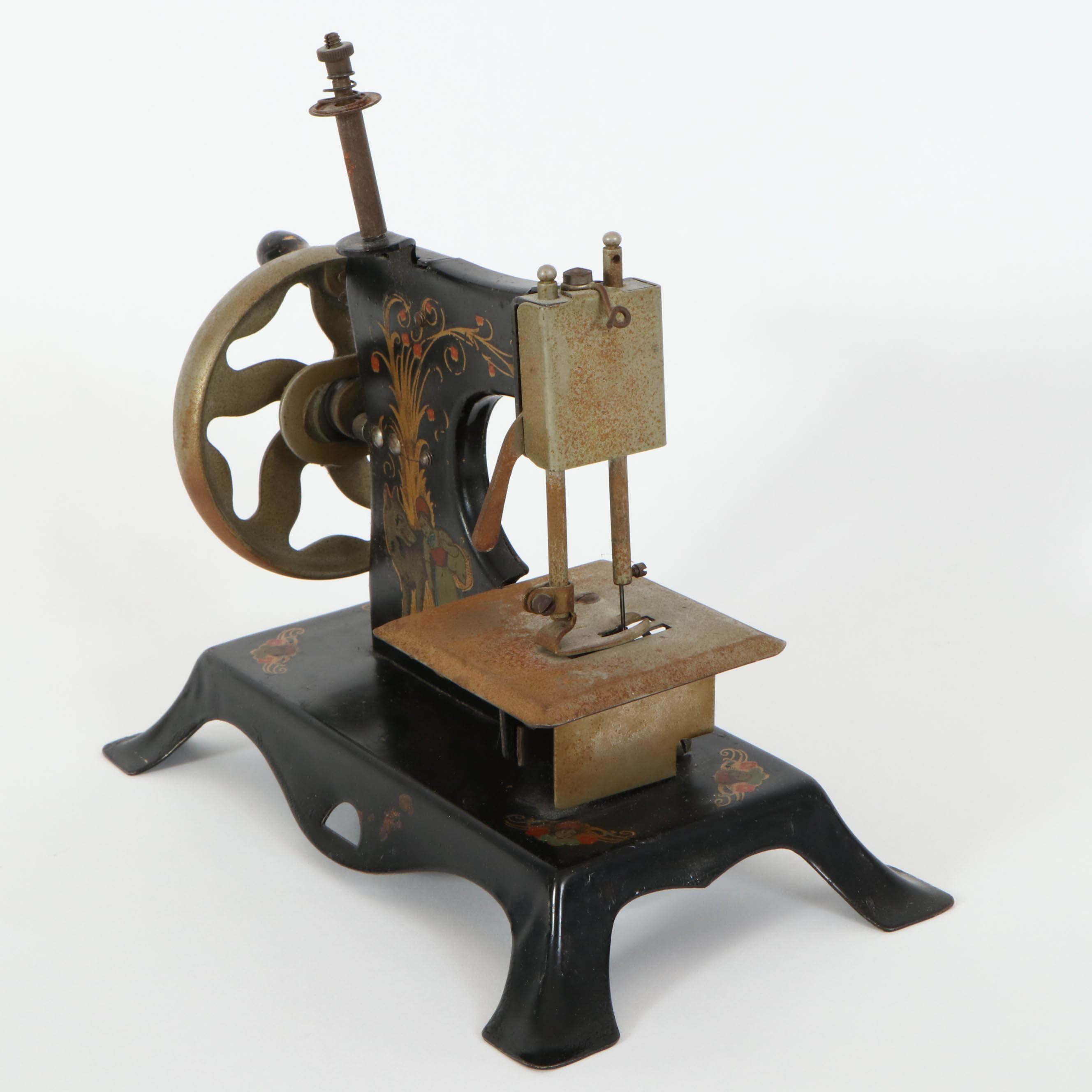 Casige German Painted Red Riding Hood Toy Sewing Machine, Mid-20th Century