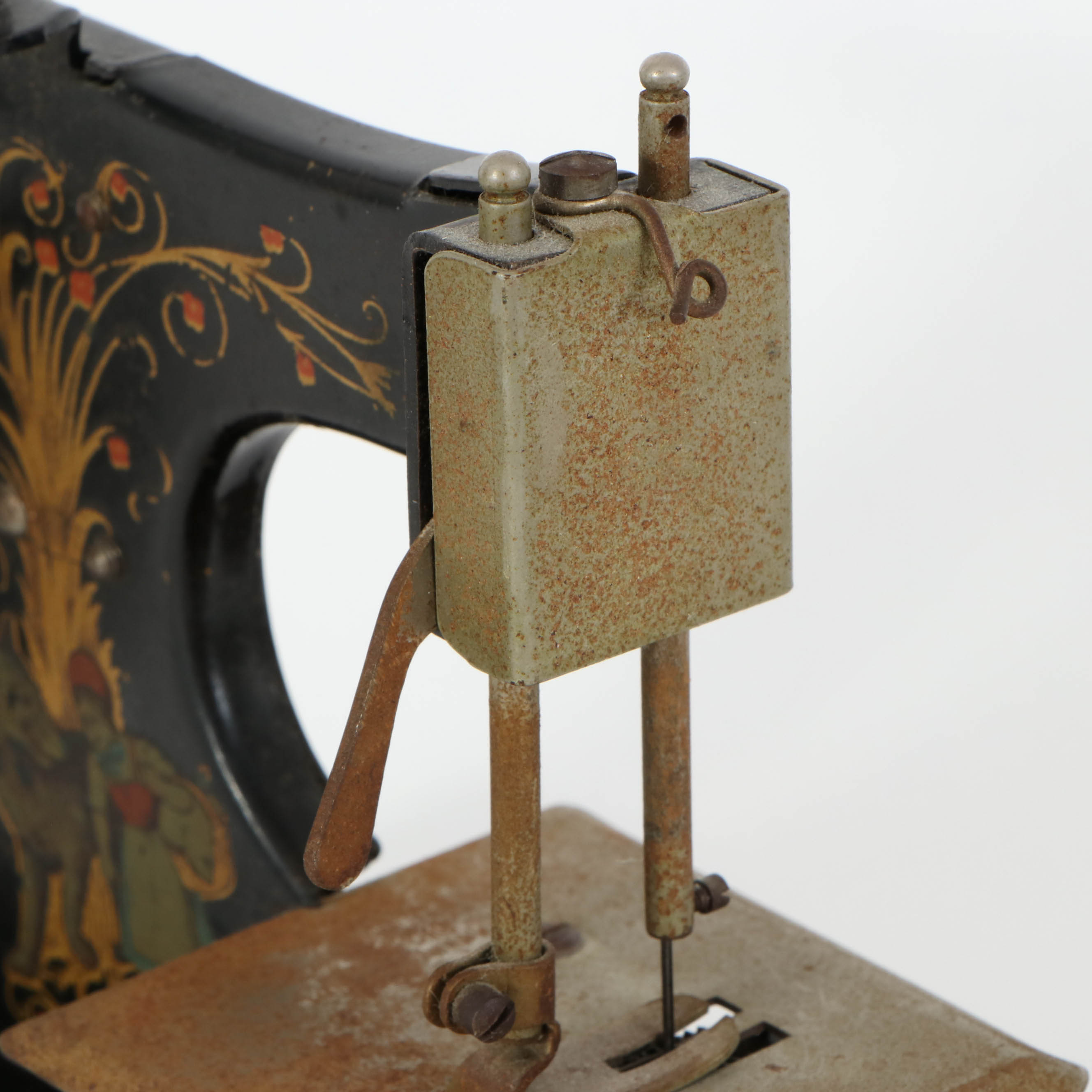 Casige German Painted Red Riding Hood Toy Sewing Machine, Mid-20th Century