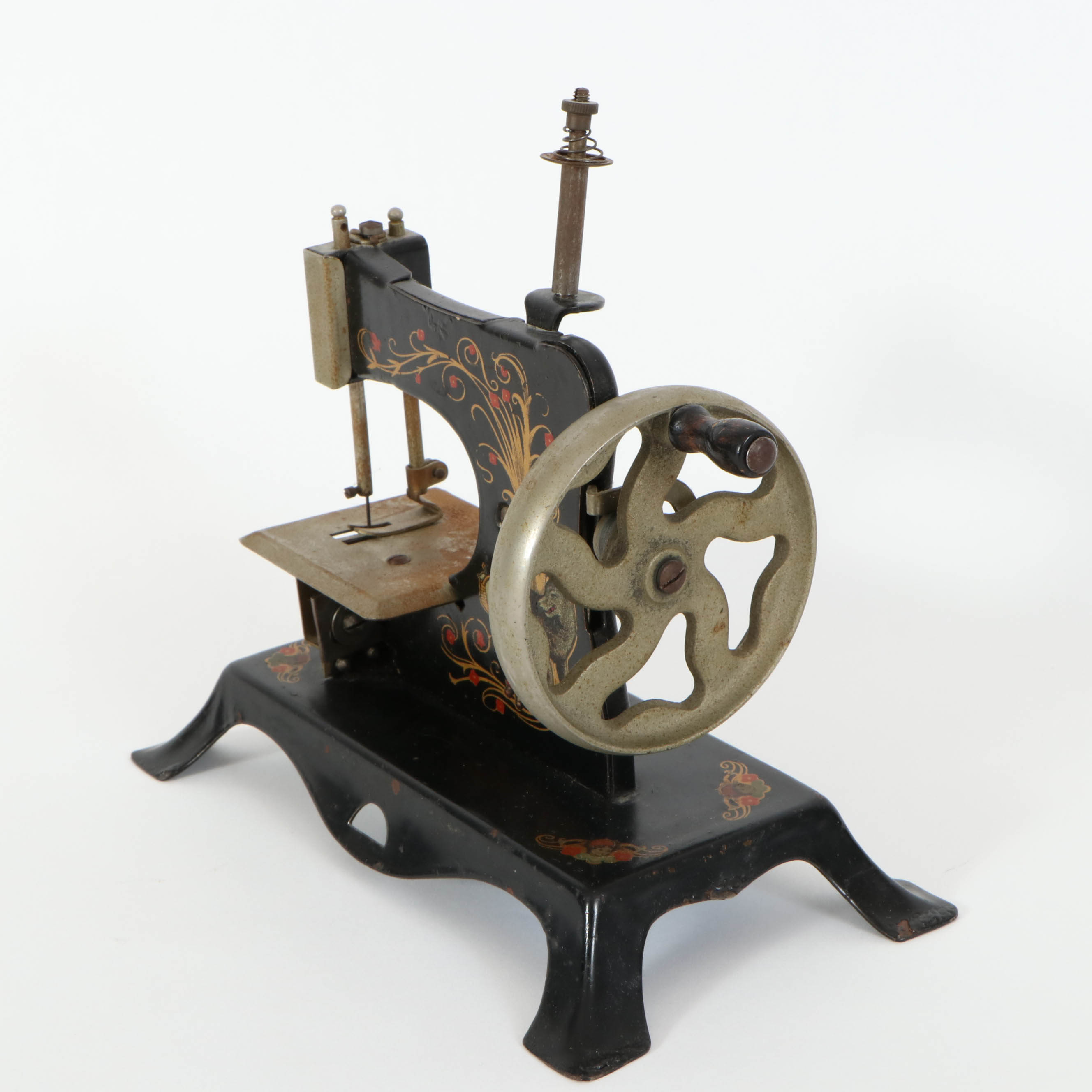 Casige German Painted Red Riding Hood Toy Sewing Machine, Mid-20th Century