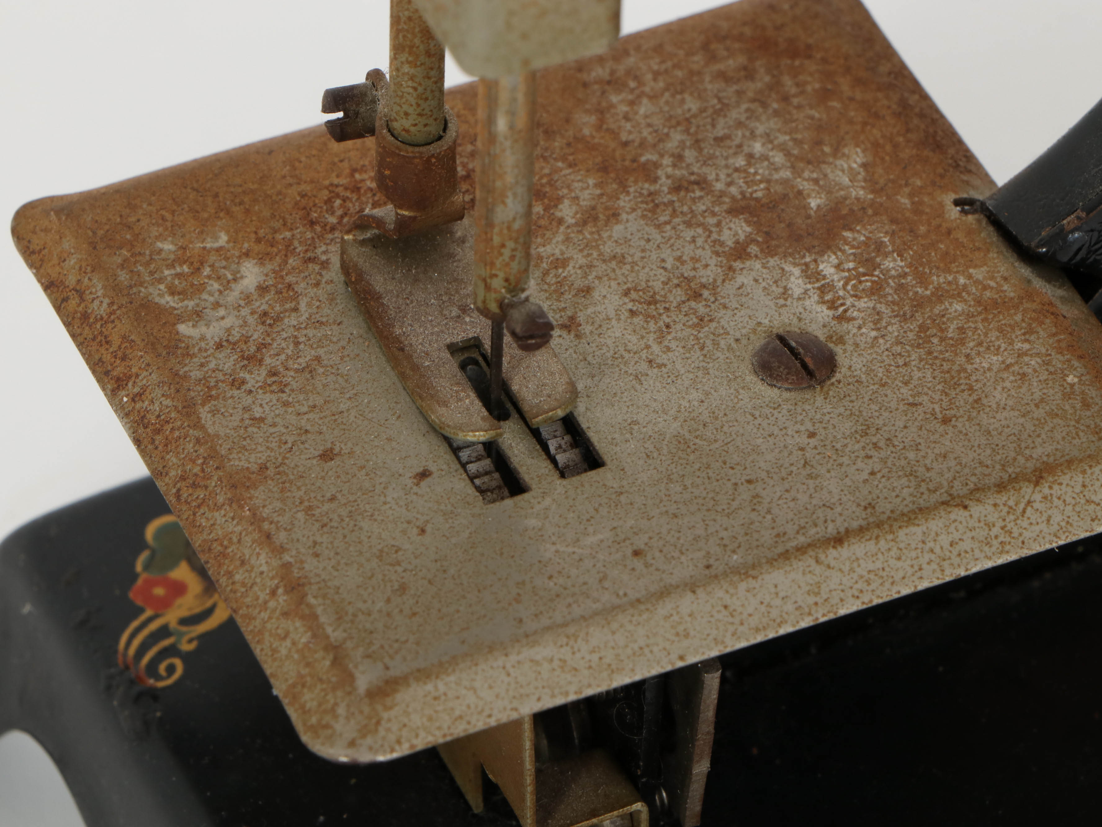 Casige German Painted Red Riding Hood Toy Sewing Machine, Mid-20th Century