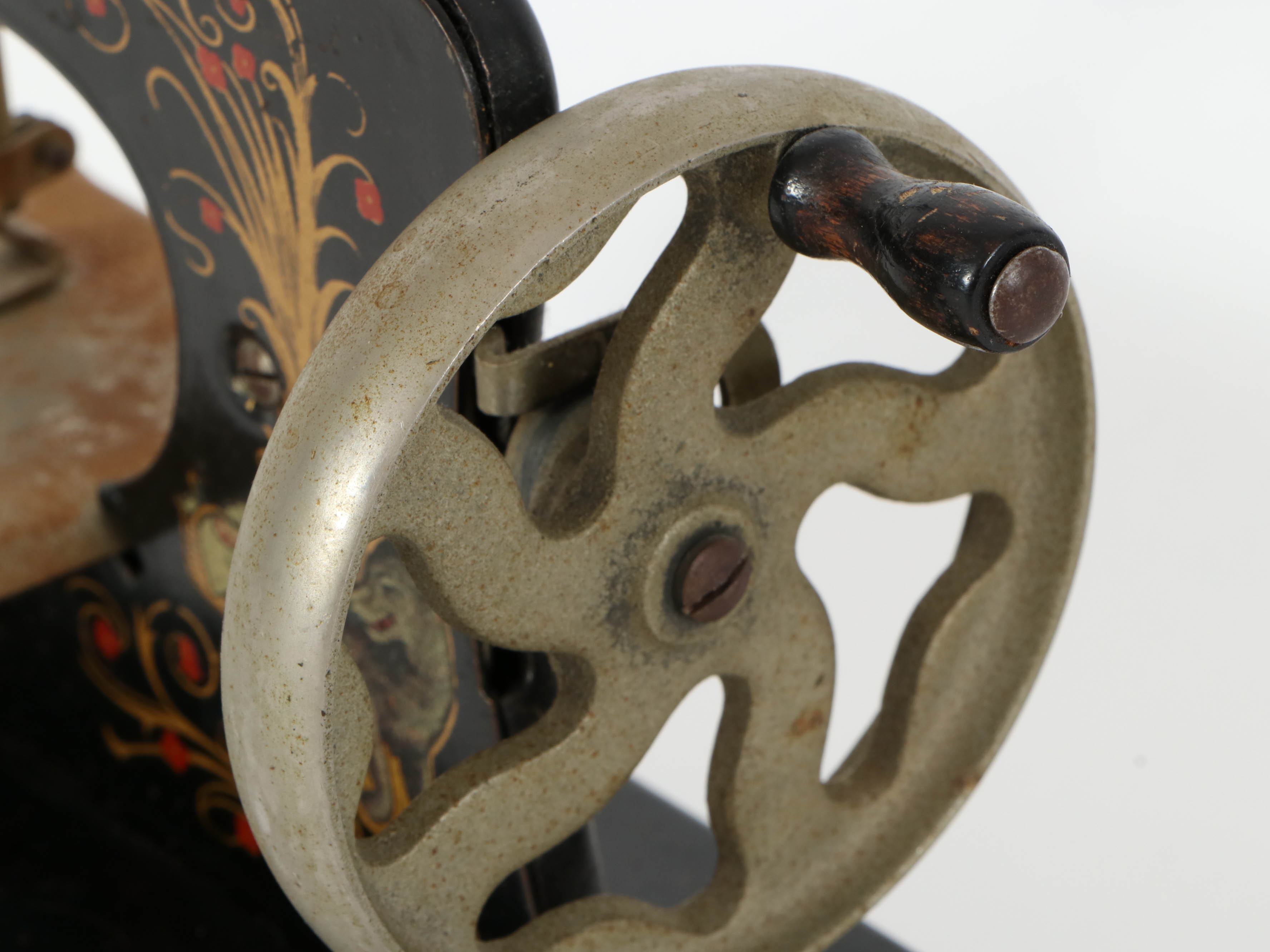 Casige German Painted Red Riding Hood Toy Sewing Machine, Mid-20th Century