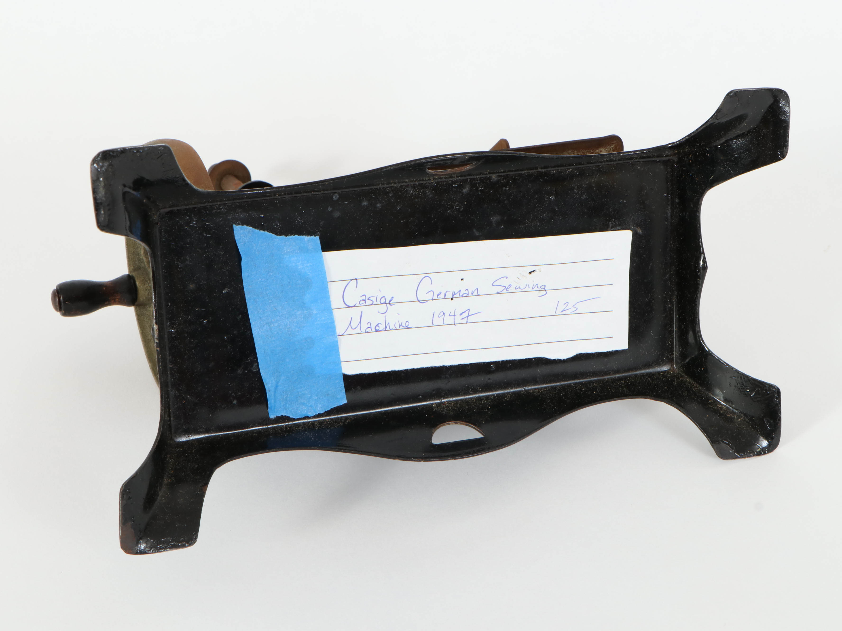 Casige German Painted Red Riding Hood Toy Sewing Machine, Mid-20th Century