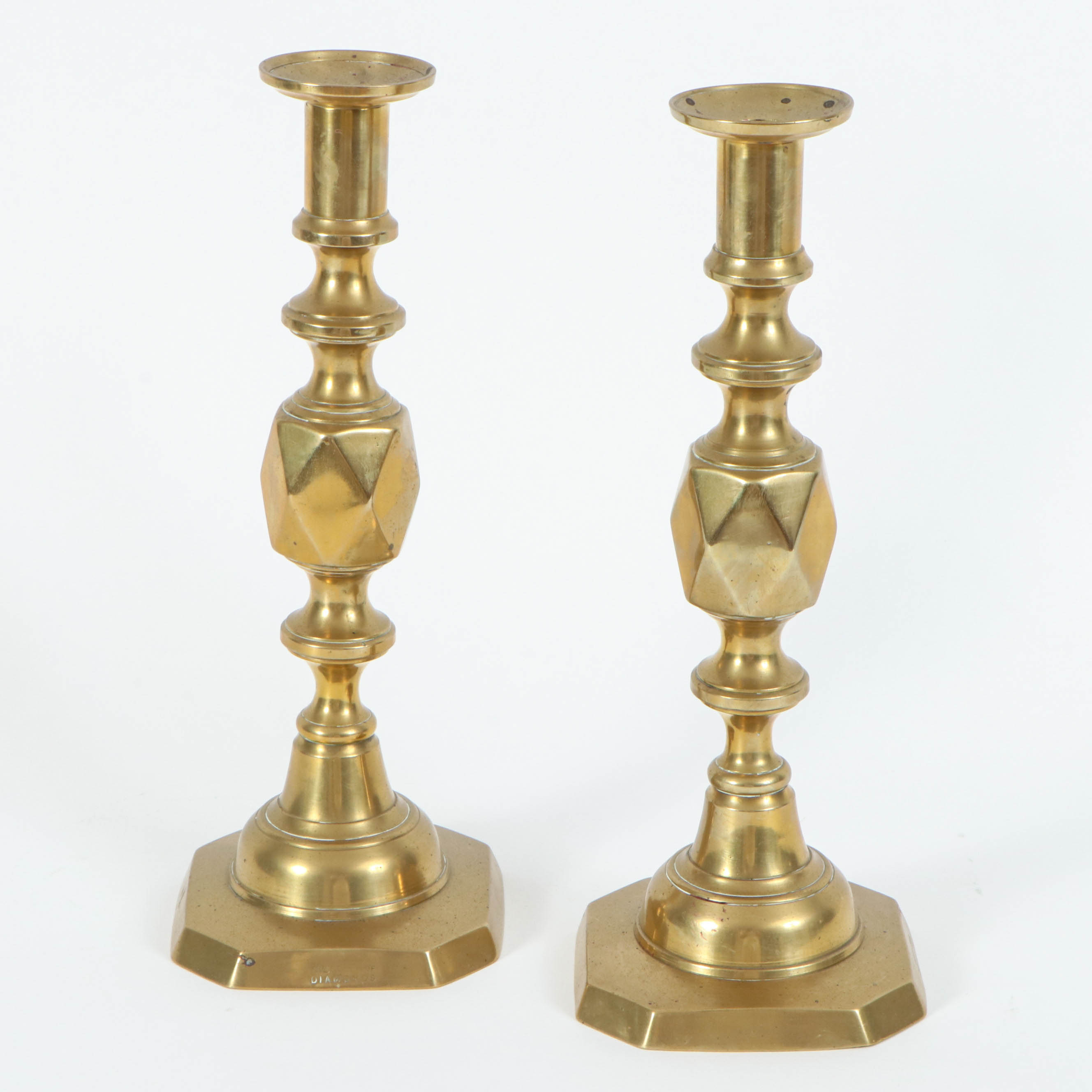English Victorian "Queen of Diamonds" Brass Ejector Candlesticks, Late 19th c.