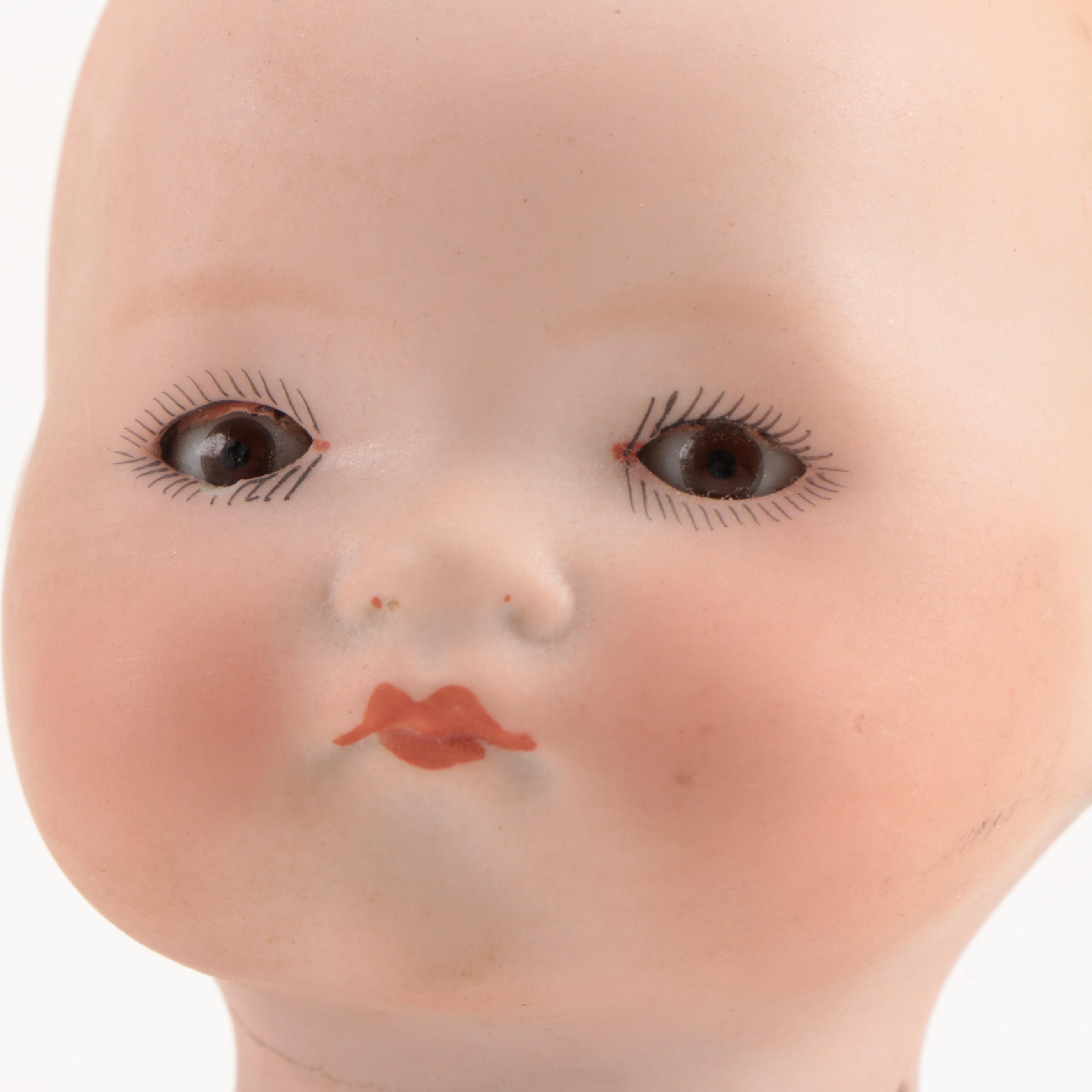 Armand Marseille "Dream Baby 341" and Other Bisque Figurines, Early 20th Century