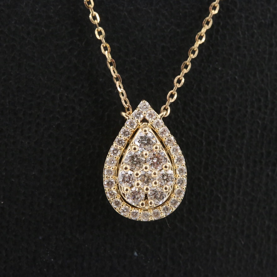 14K Diamond Station Necklace with Pear Shaped Center