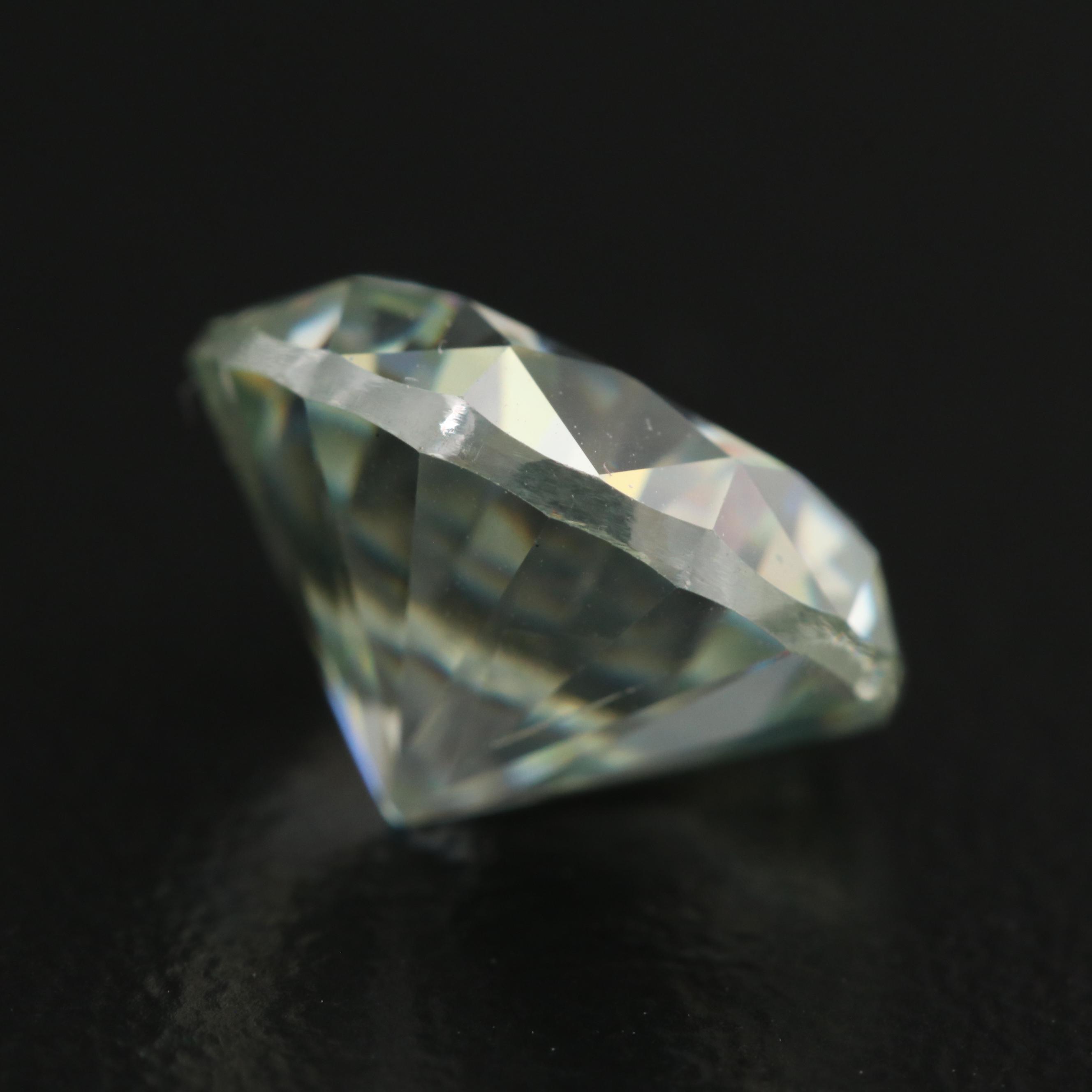 Loose Lab Grown 4.85 CT Round Faceted Moissanite