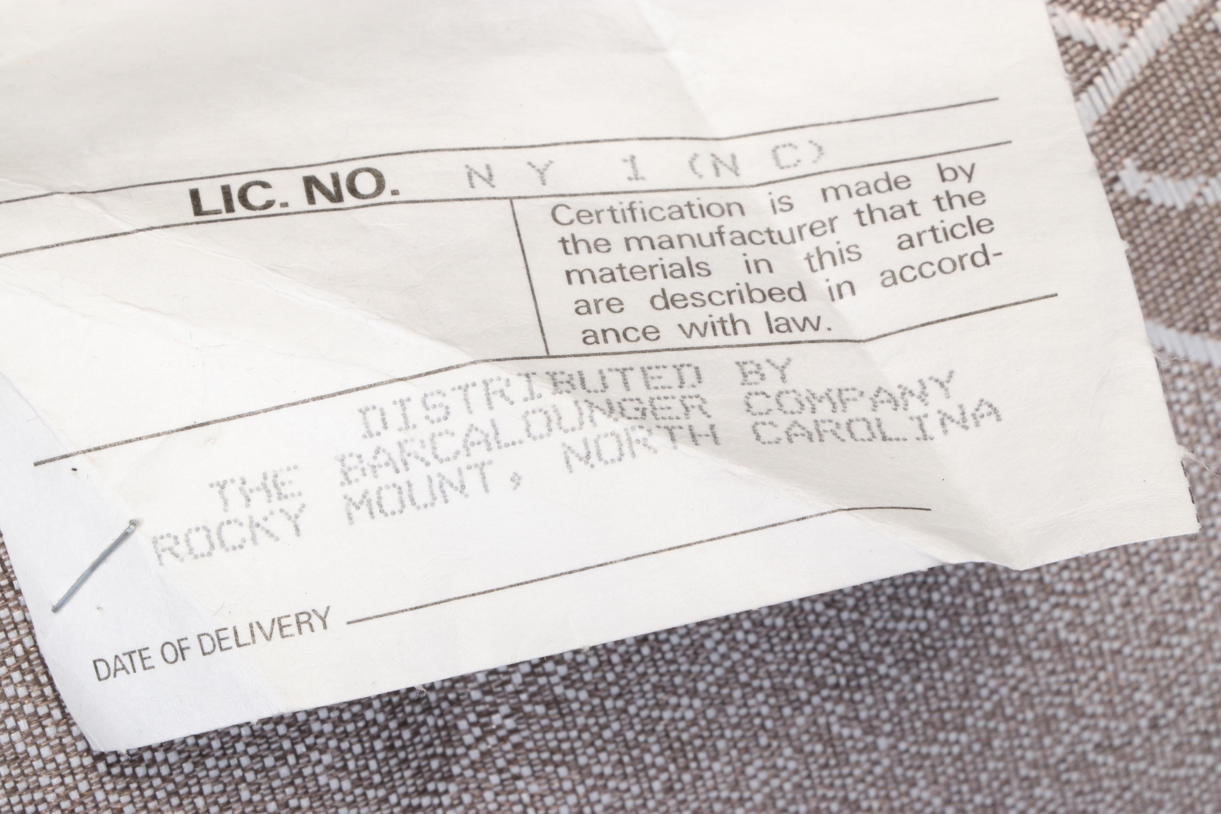 The Barcalounger Company Green Leather Reclining Armchair and Ottoman