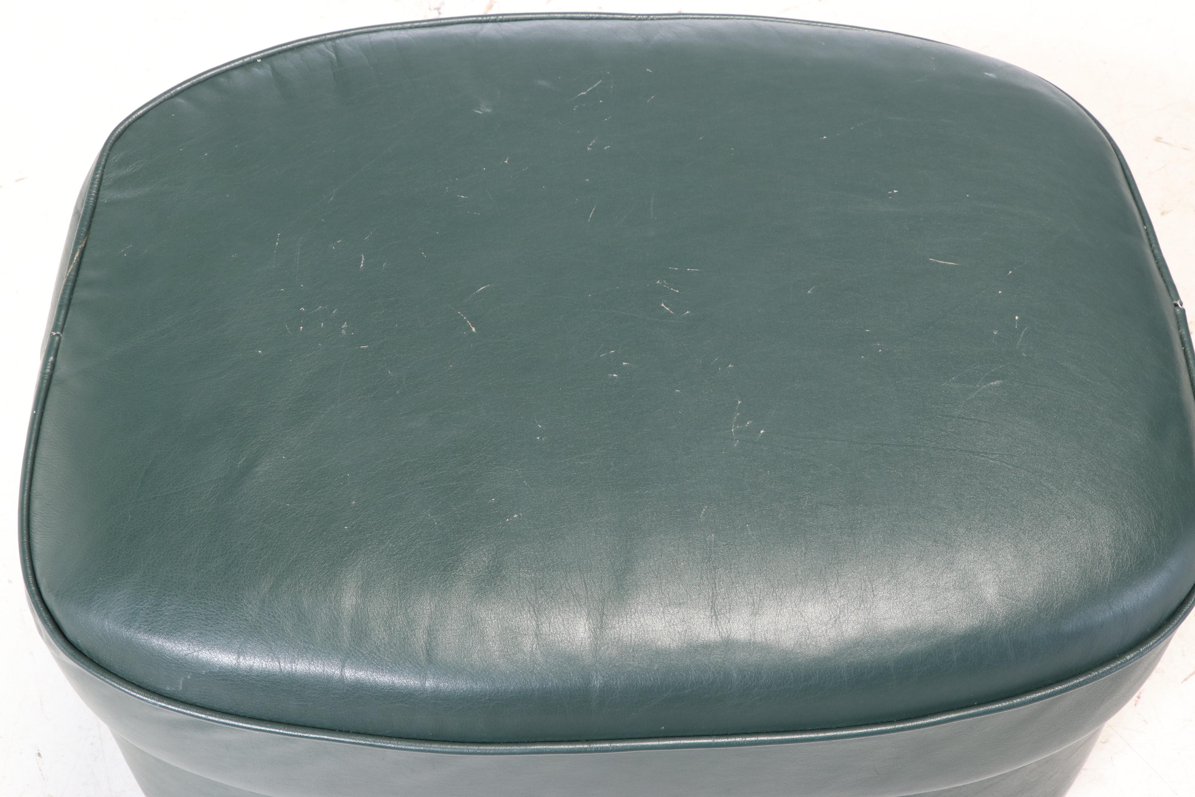 The Barcalounger Company Green Leather Reclining Armchair and Ottoman