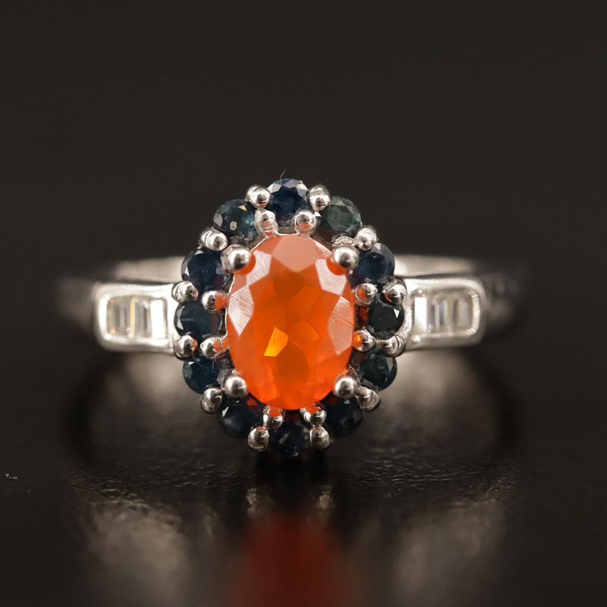 Sterling Fire Opal Ring with Sapphire Halo and Cubic Zirconia Lined Shoulders