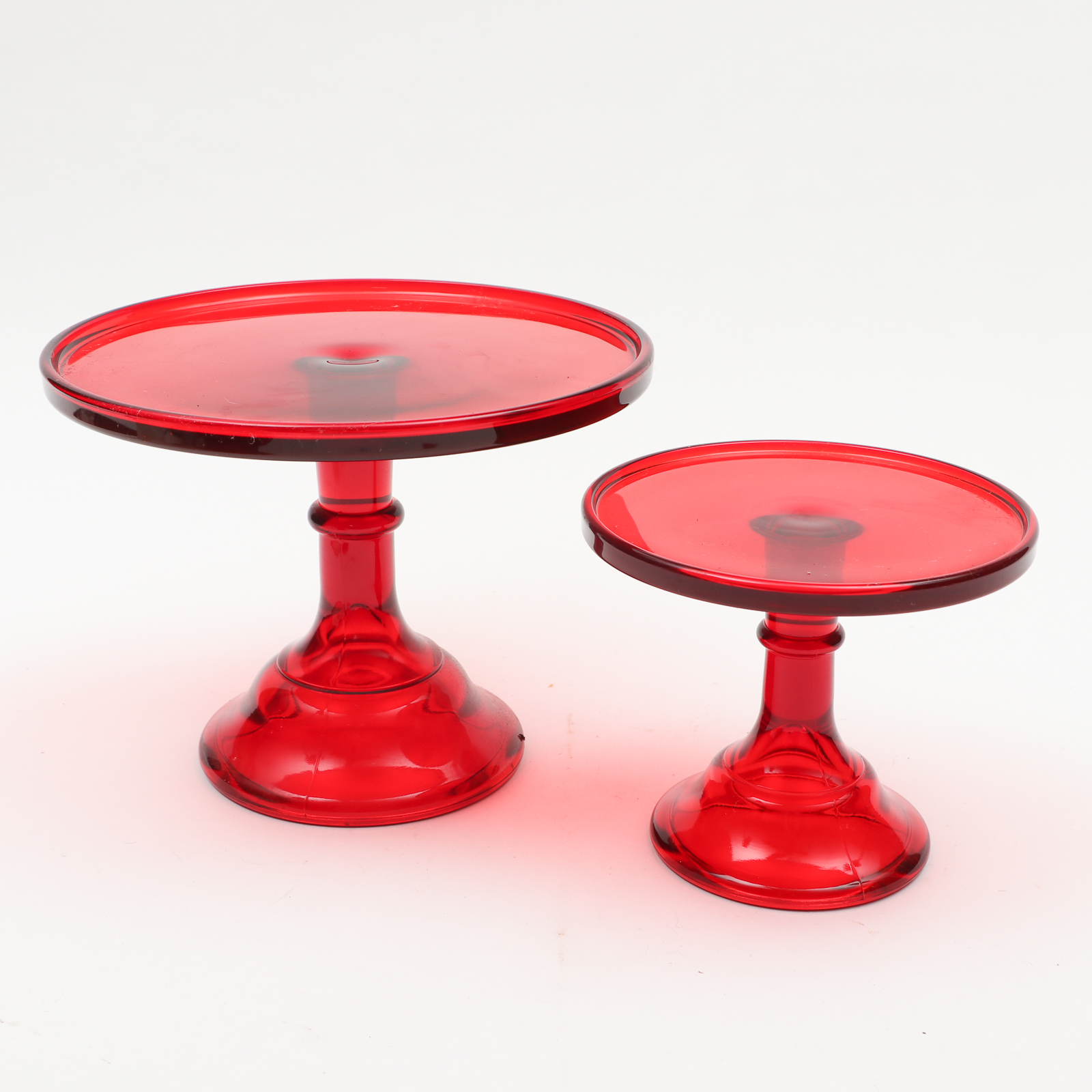 Cranberry Glass Pedestal Dishes and Covered Butter Dish