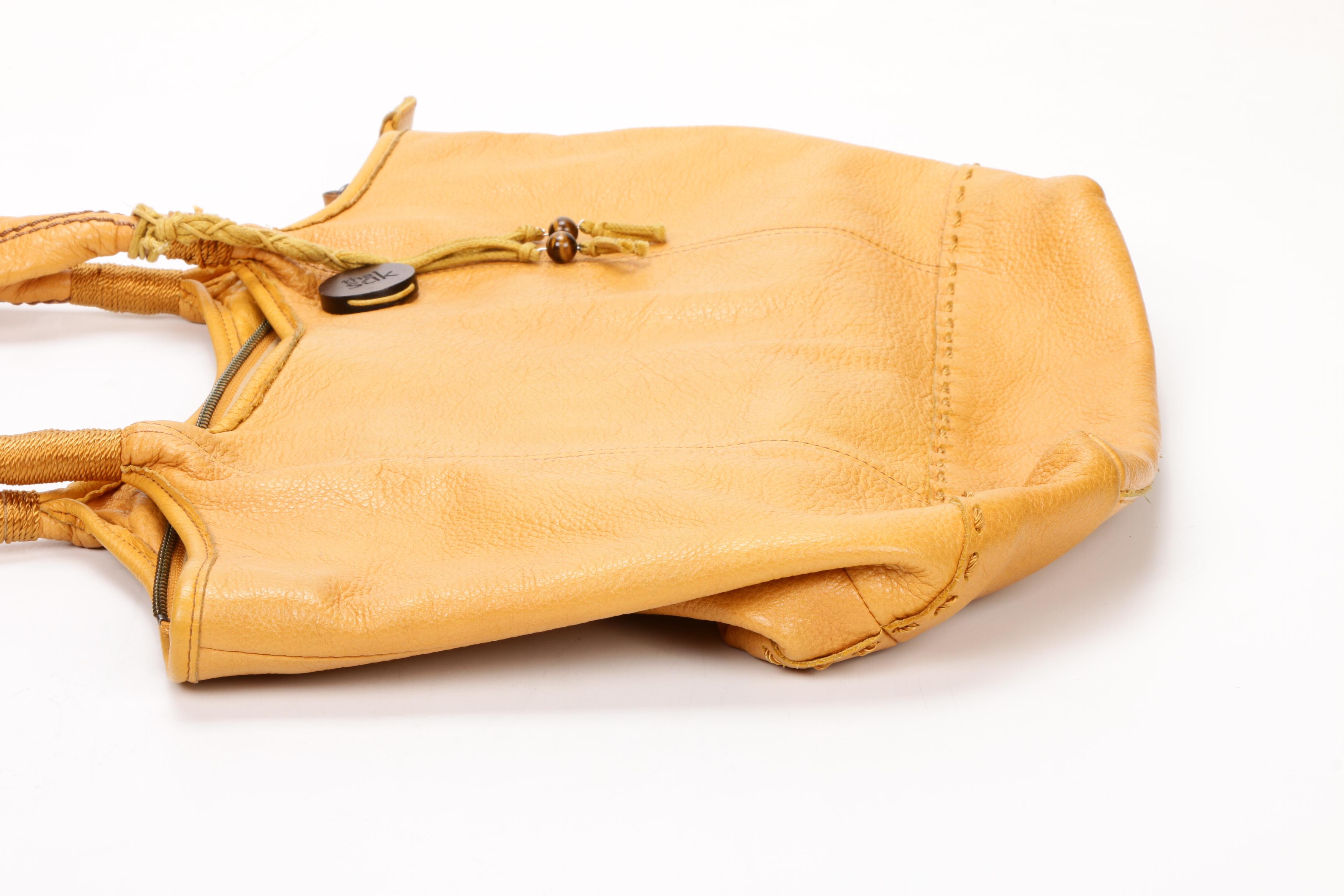 Marc Jacobs, Coach, and The Sak Handbags with Tory Burch Flip-Flops