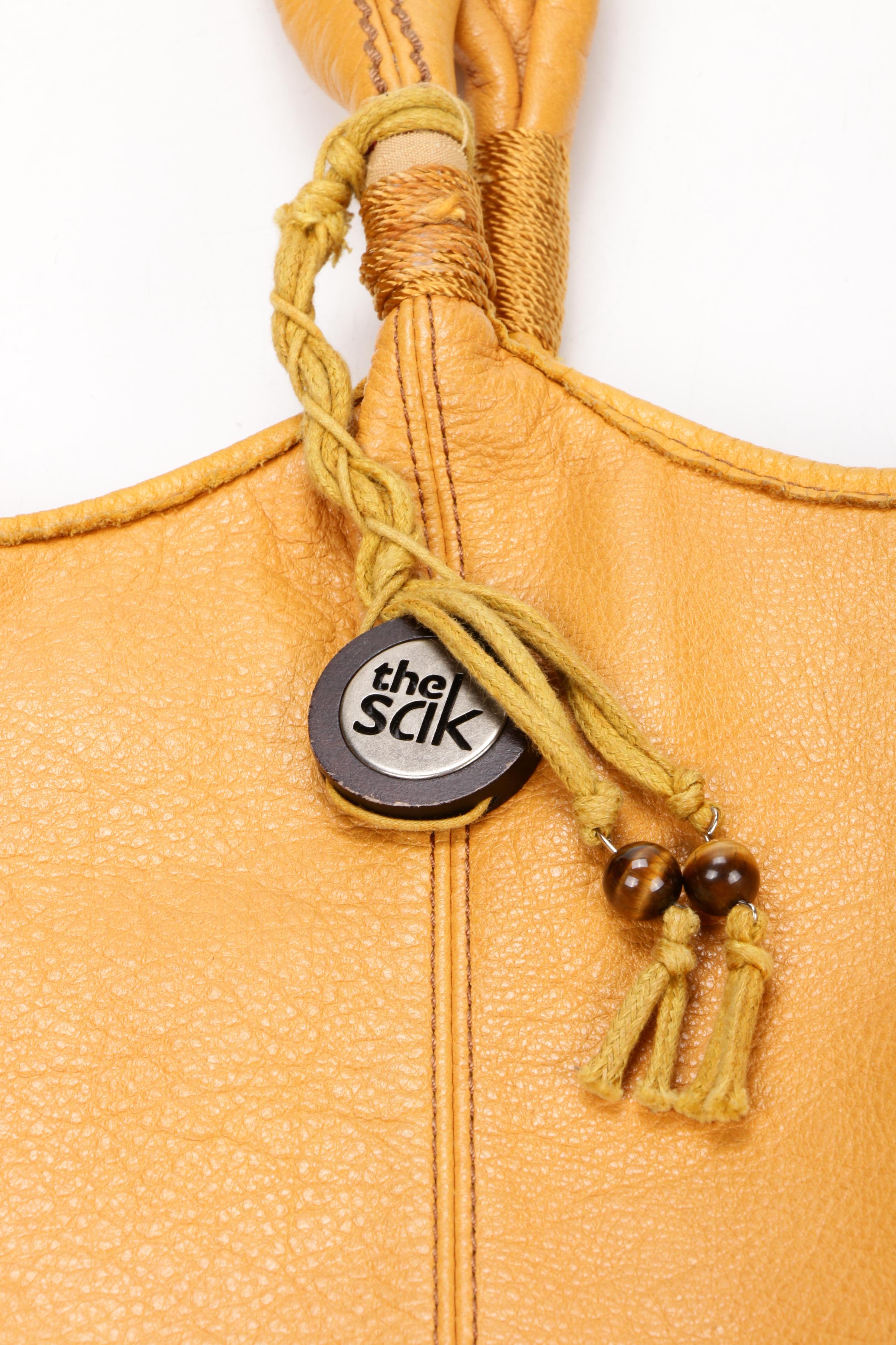 Marc Jacobs, Coach, and The Sak Handbags with Tory Burch Flip-Flops