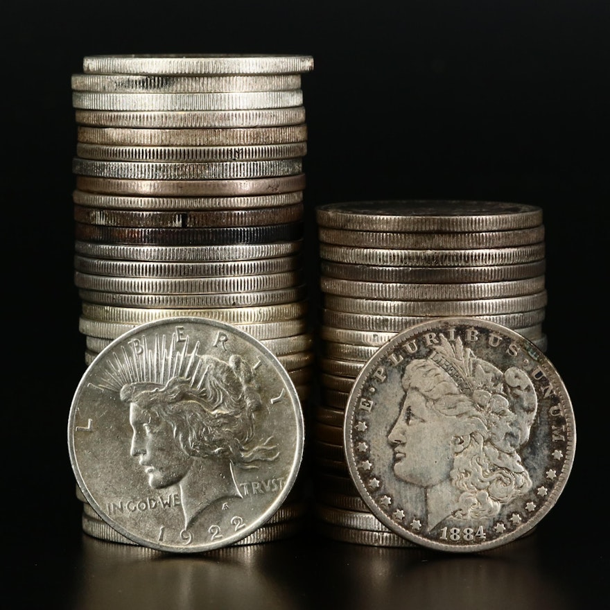 Fifty-One Morgan and Peace Silver Dollars