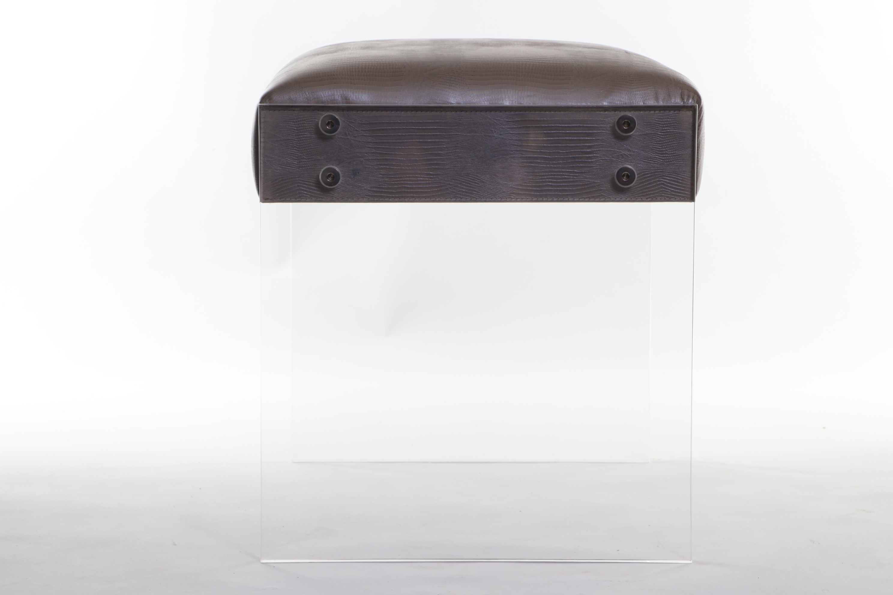 Interlude Home Acrylic Ottoman with Faux Leather Upholstery