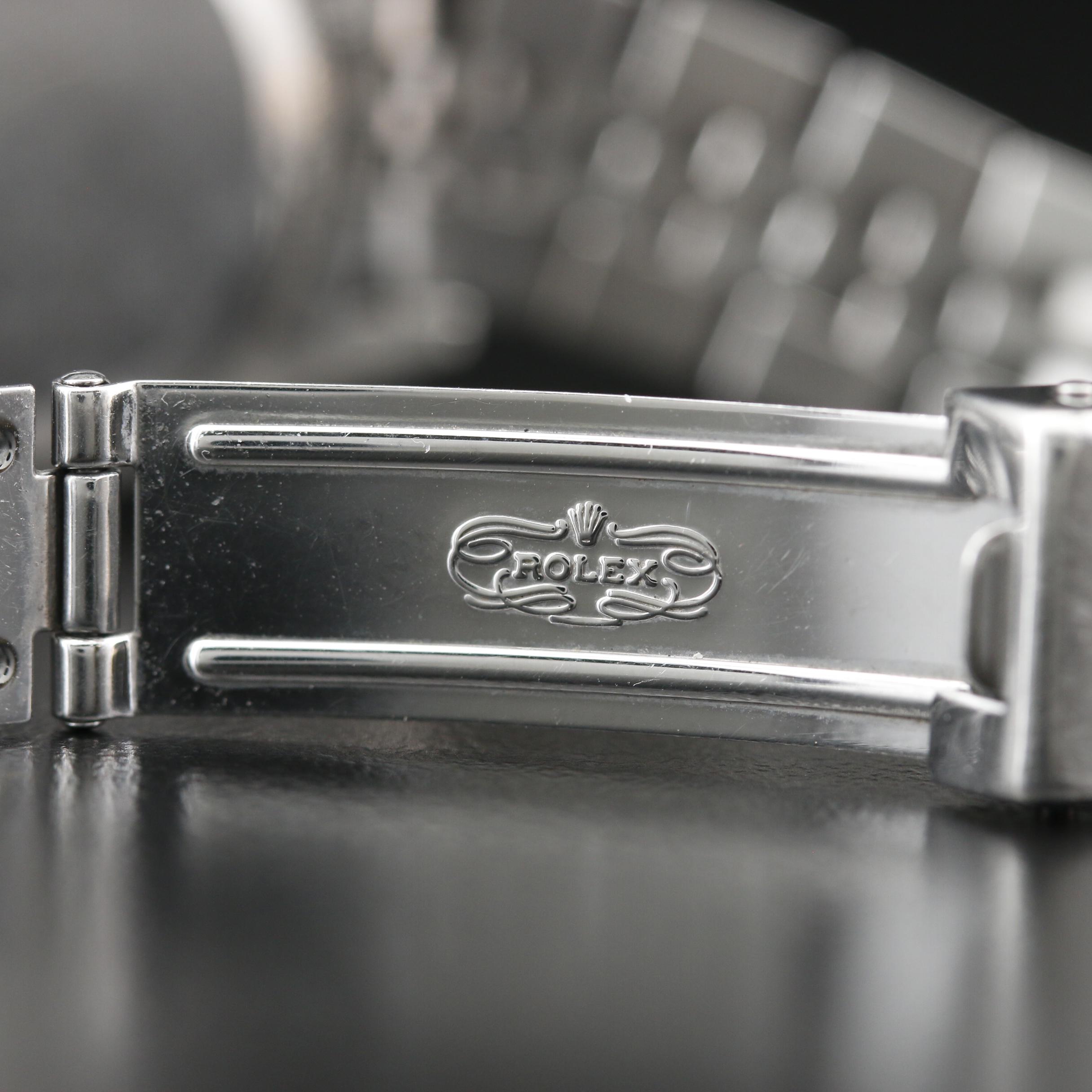 2004 Rolex Datejust Silver Roman Dial Watch with 18K Bezel