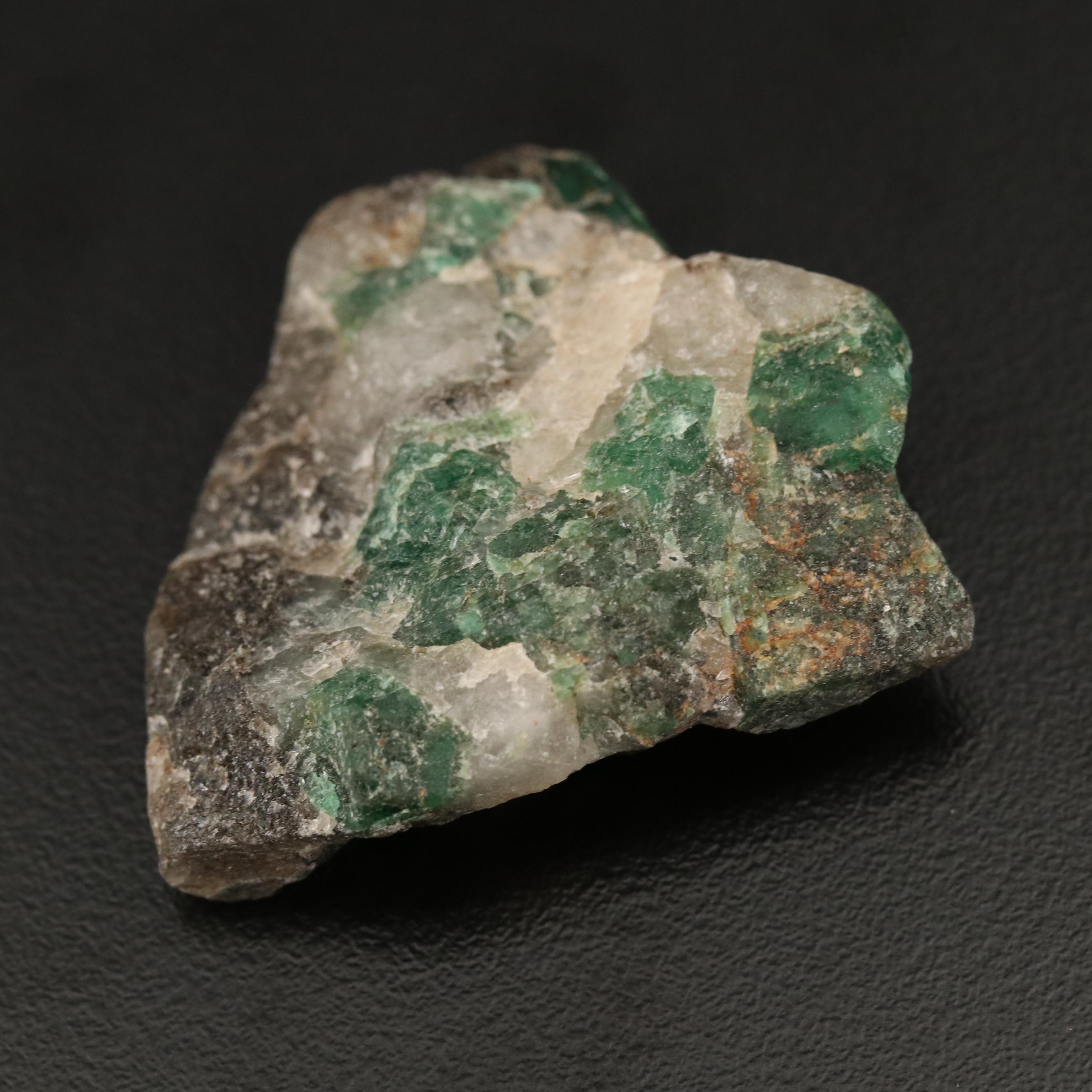 143.77 CTW Rough Cut Emeralds