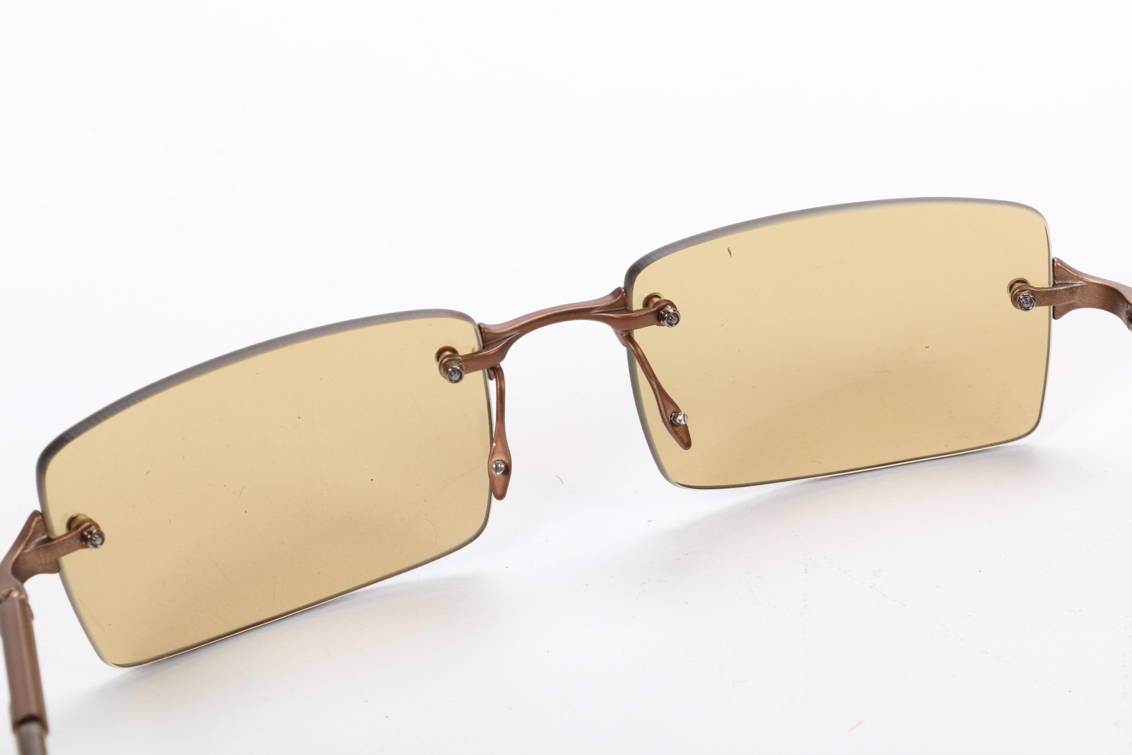 Prada VPR 67C Rimless Brown Sunglasses