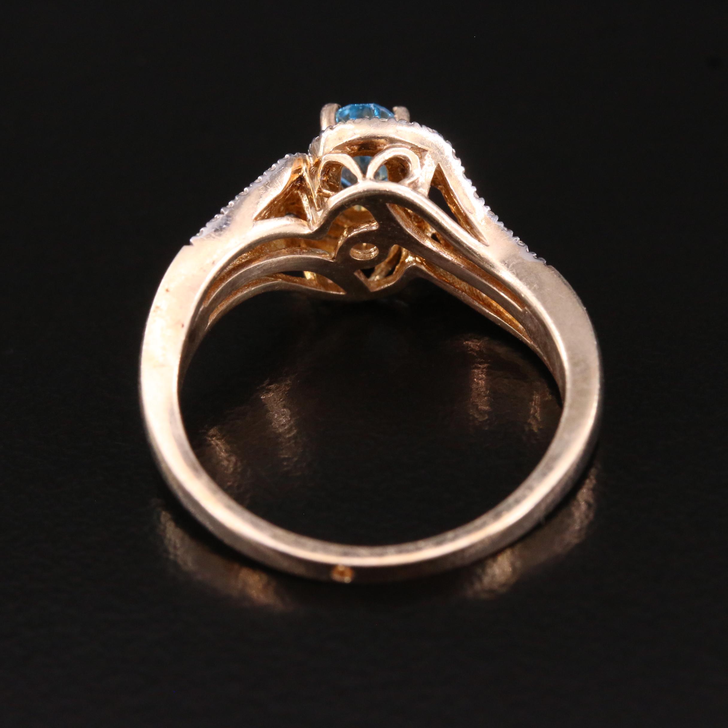 Sterling Silver Swiss BlueTopaz and Diamond Contour Ring