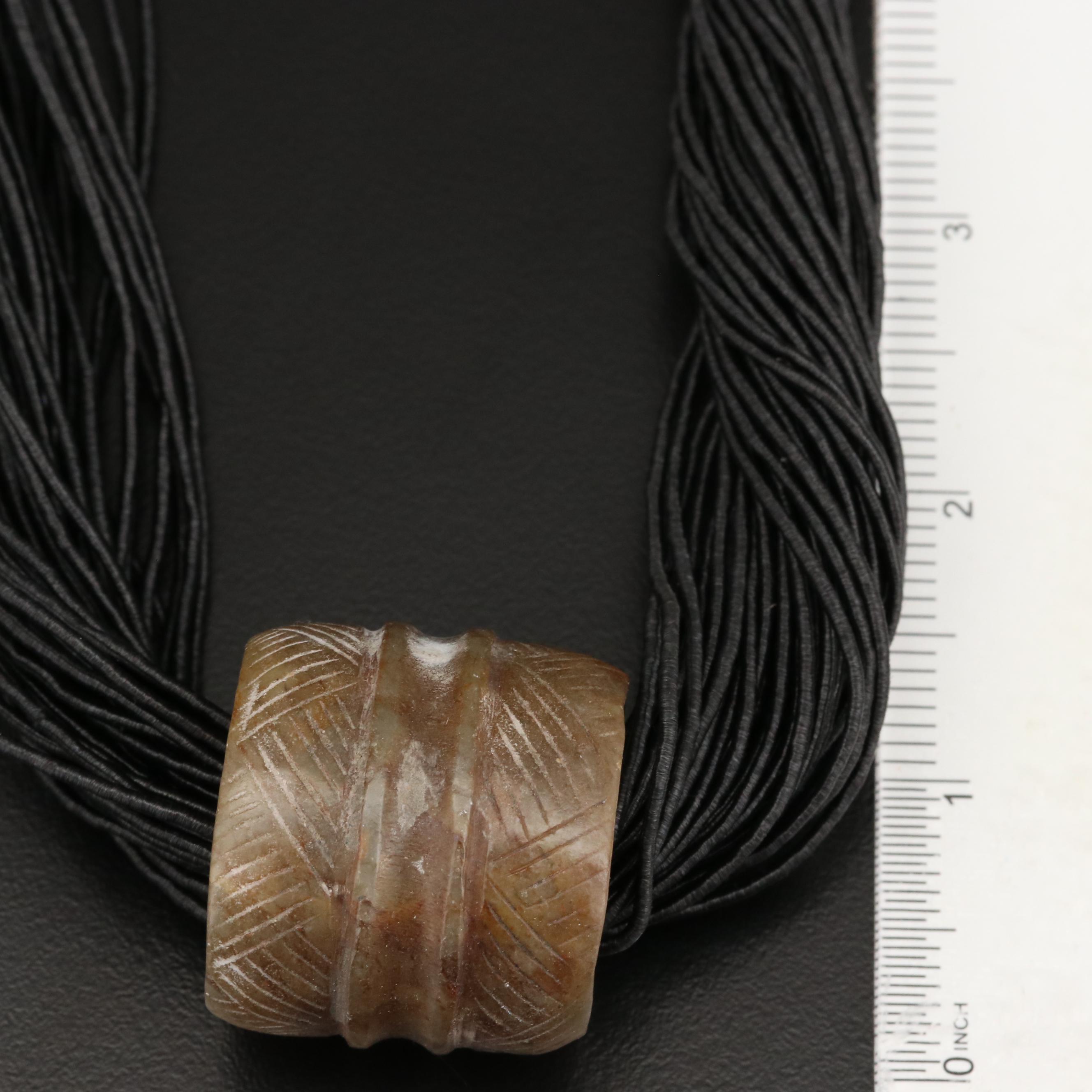 Carved Serpentine Slide On Multi-Strand Cord Necklace