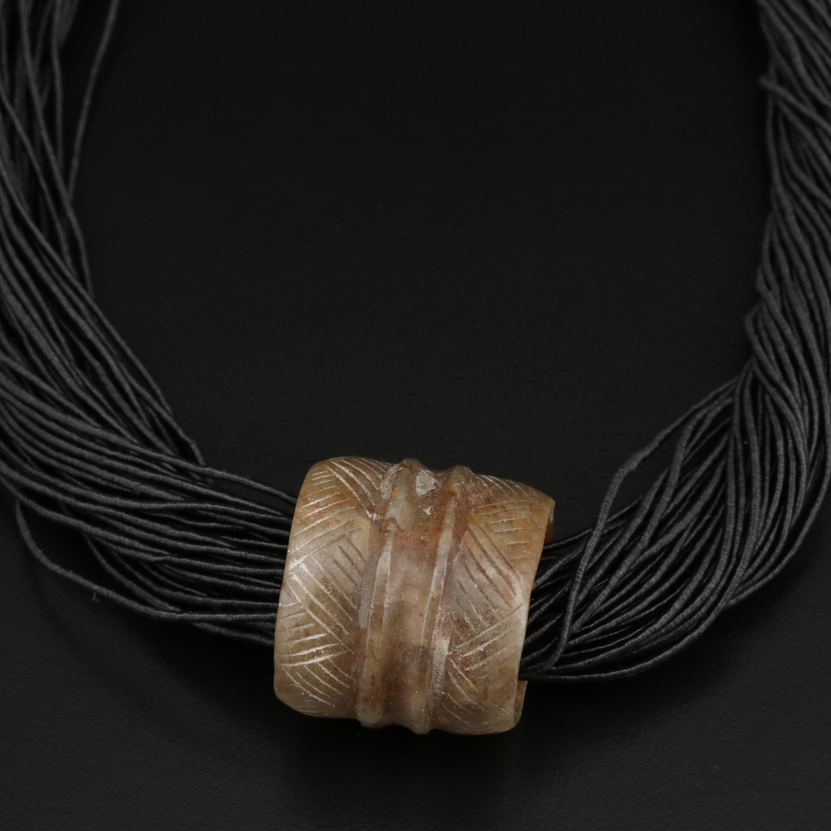 Carved Serpentine Slide On Multi-Strand Cord Necklace