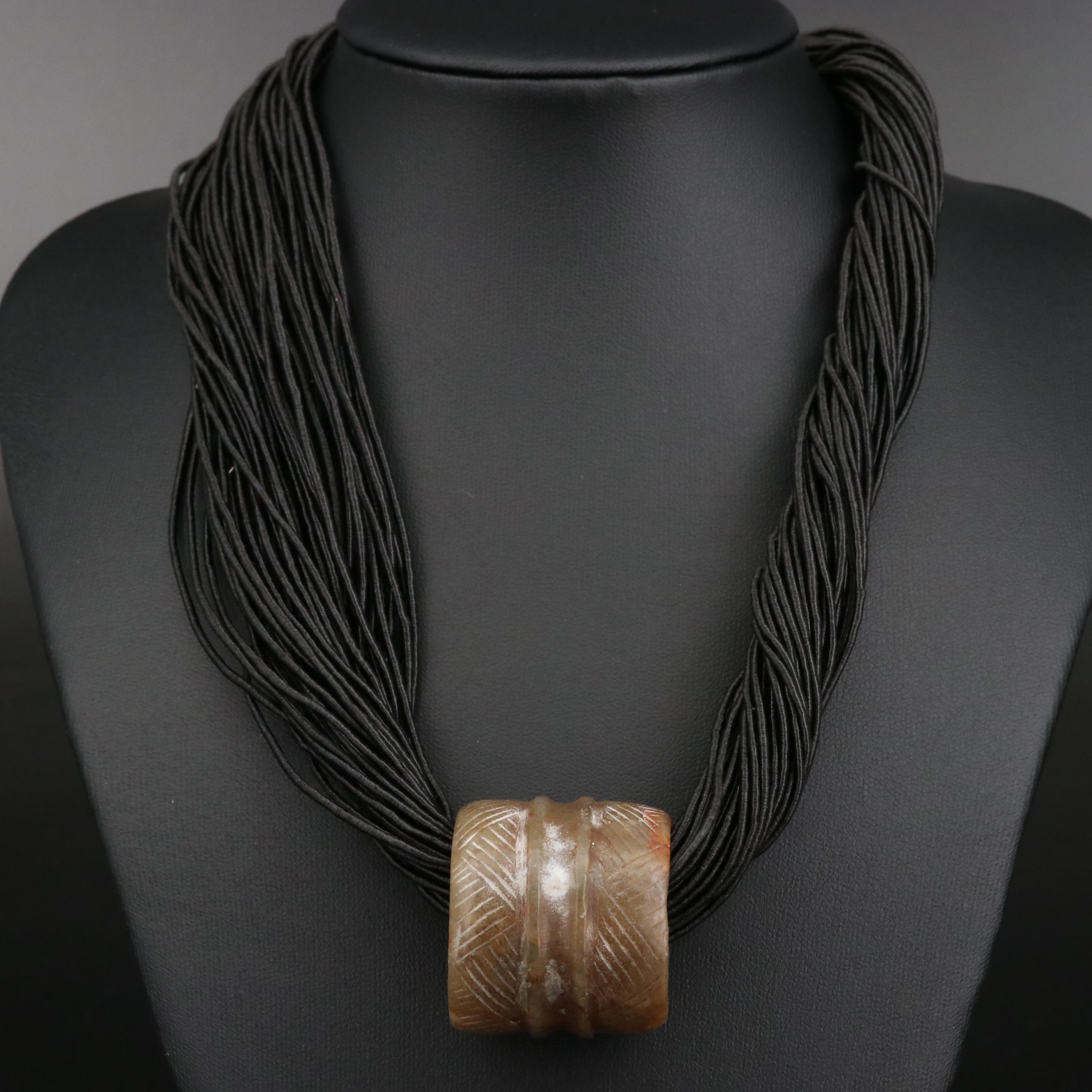 Carved Serpentine Slide On Multi-Strand Cord Necklace