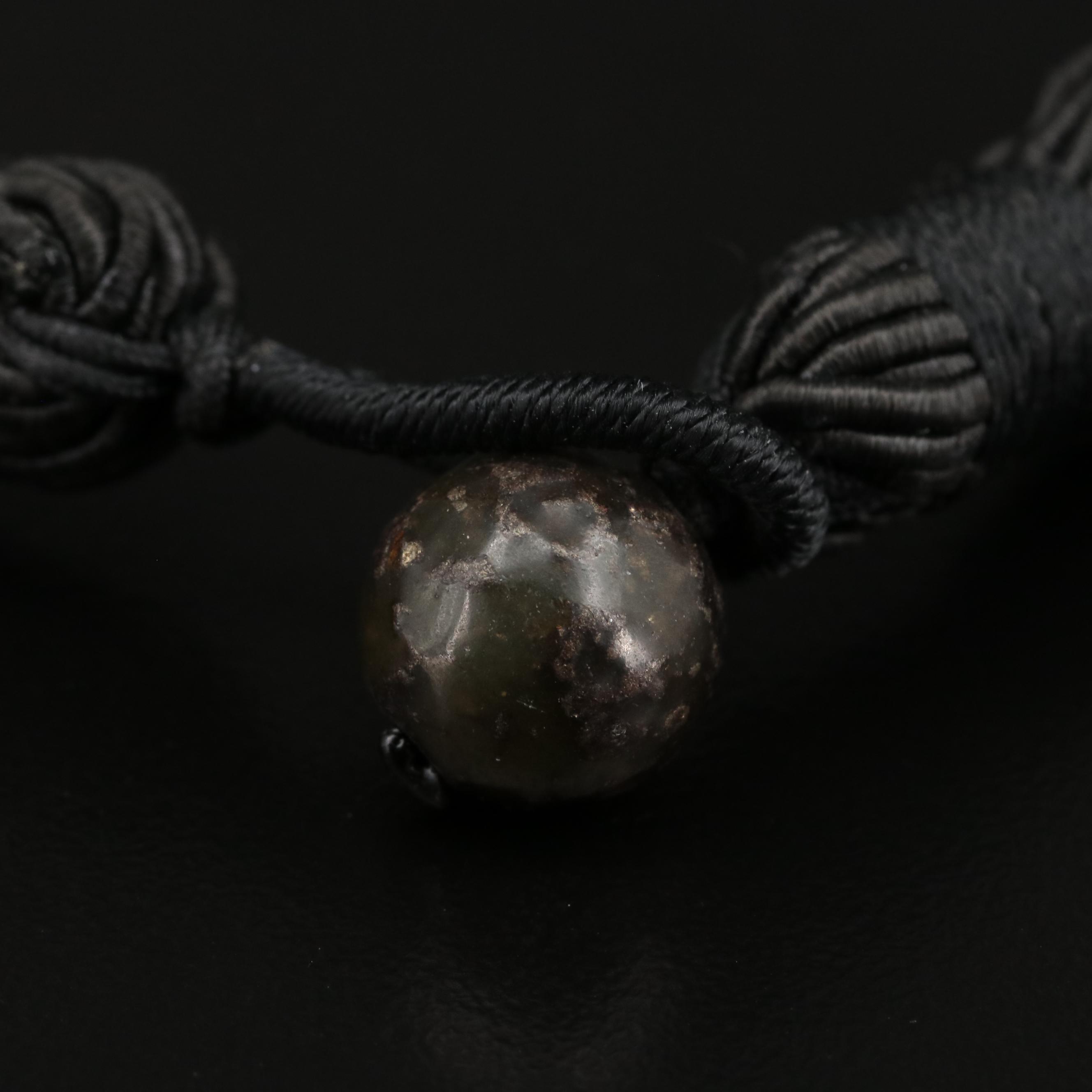 Carved Serpentine Slide On Multi-Strand Cord Necklace