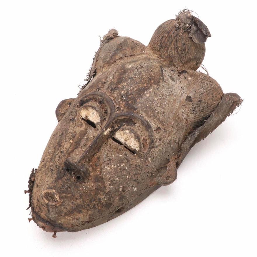 Baule Carved Wood Mask with Mud Patina, West Africa