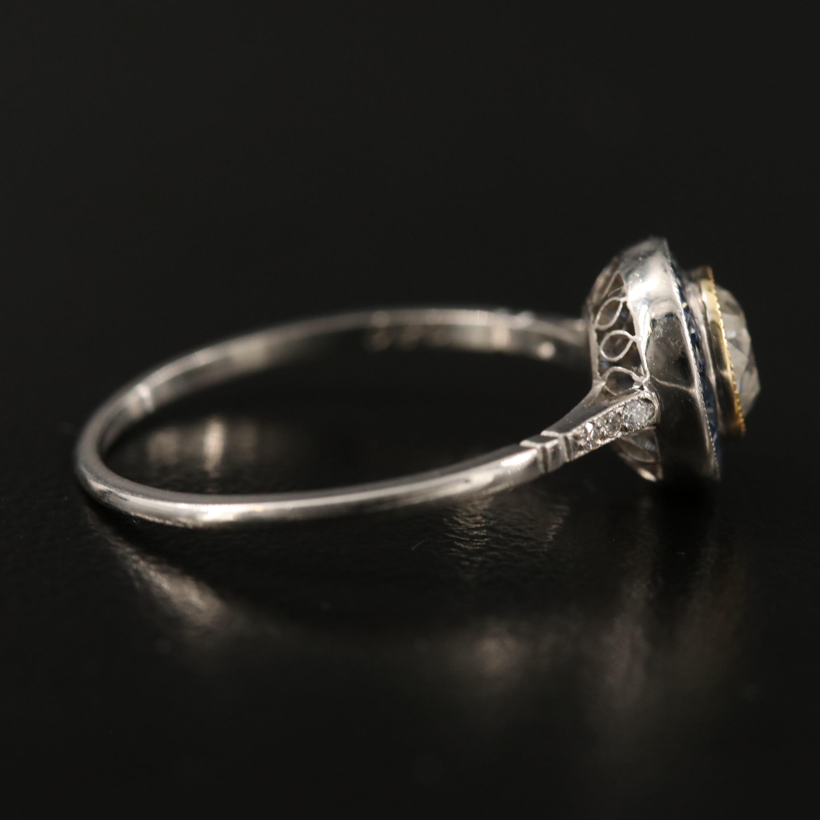 Vintage Platinum Diamond Ring with Sapphire Halo