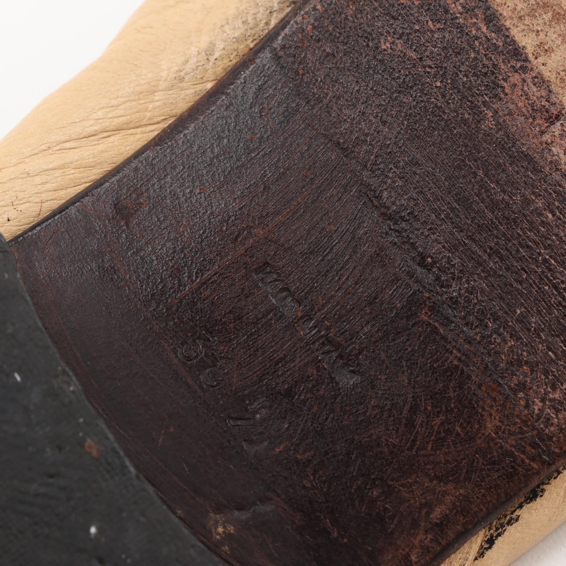 Chanel CC Cap-Toe Flats in Nude and Black Leather