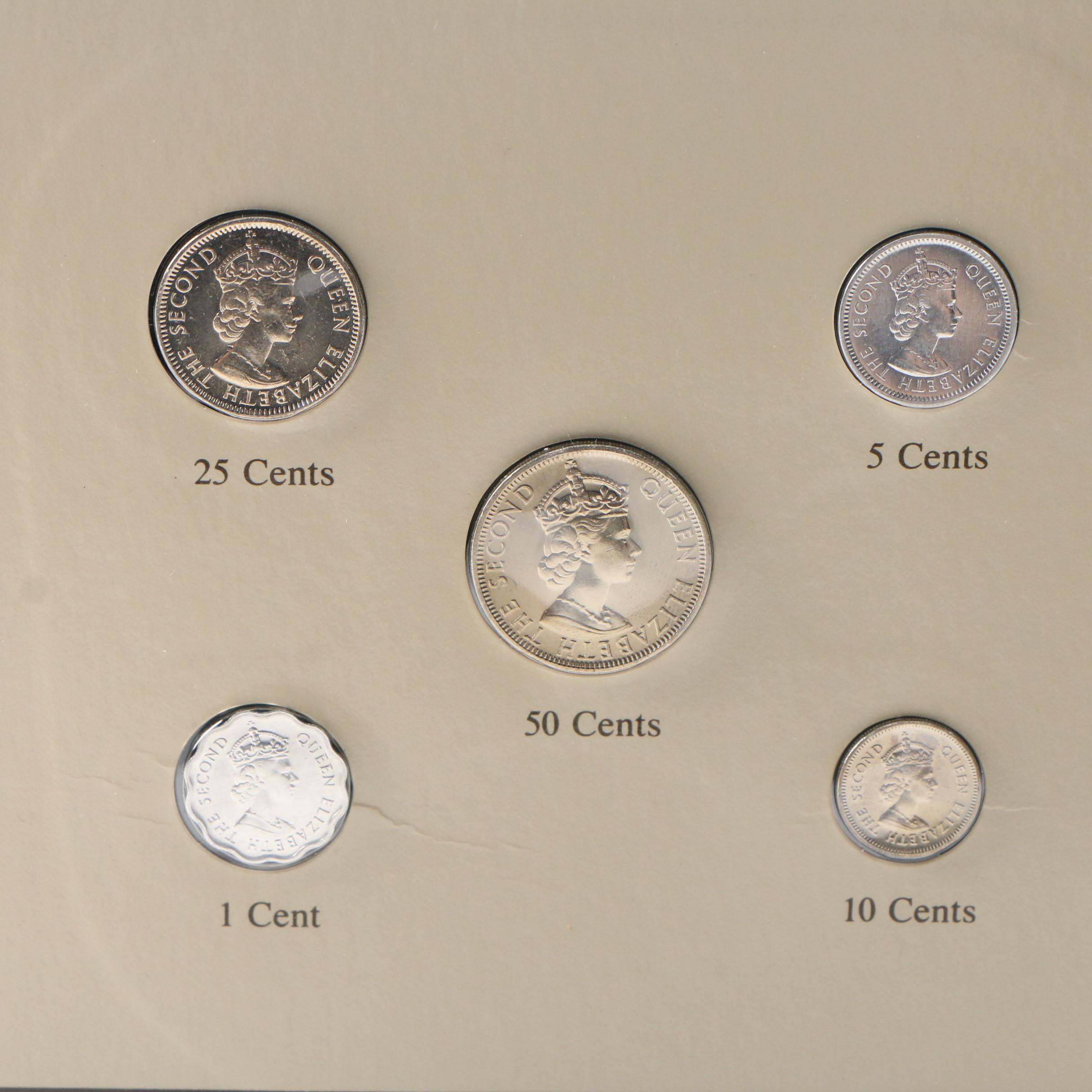 Franklin Mint "Coin Sets of All Nations" with Stamps Volumes 1–3