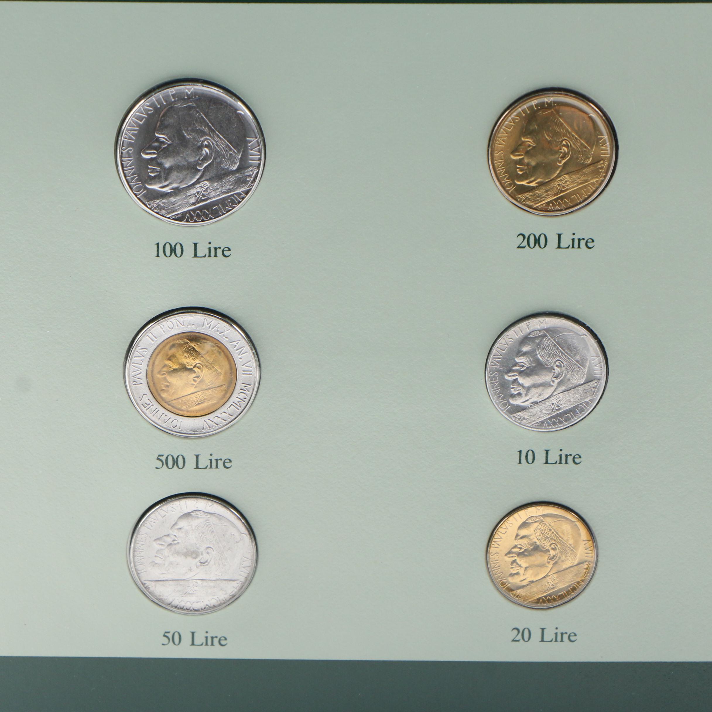 Franklin Mint "Coin Sets of All Nations" with Stamps Volumes 1–3