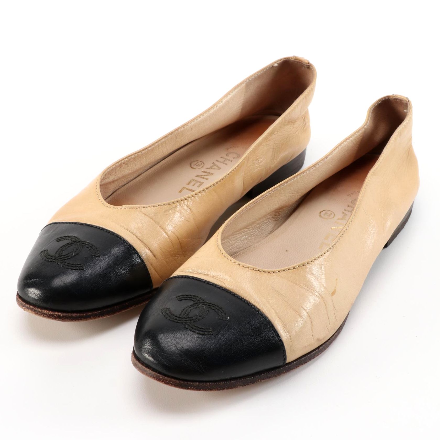 Chanel CC Cap-Toe Flats in Nude and Black Leather