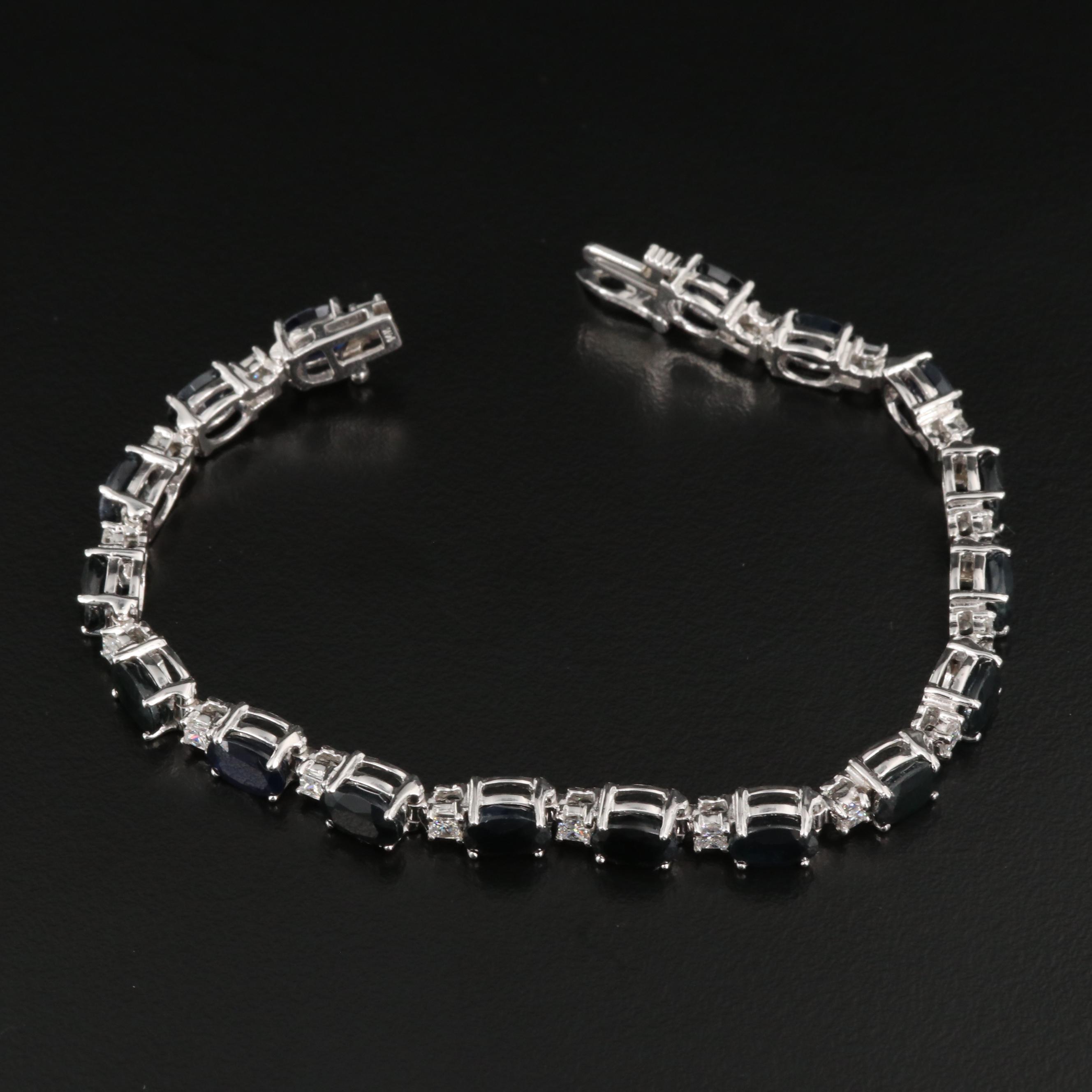 14K 18.23 CTW Sapphire and 1.40 CTW Diamond Line Bracelet