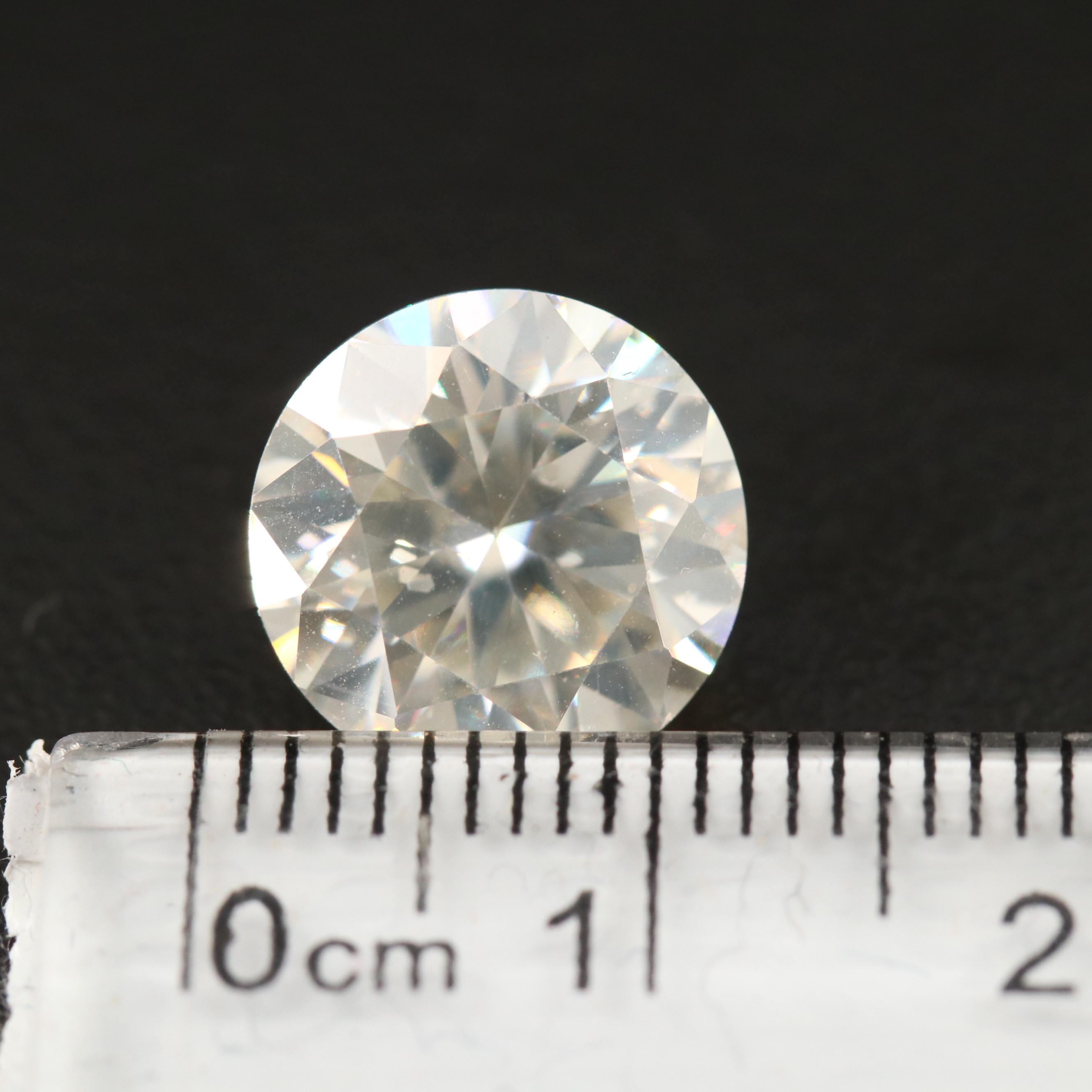Loose Lab Grown 4.79 CT Round Faceted Moissanite