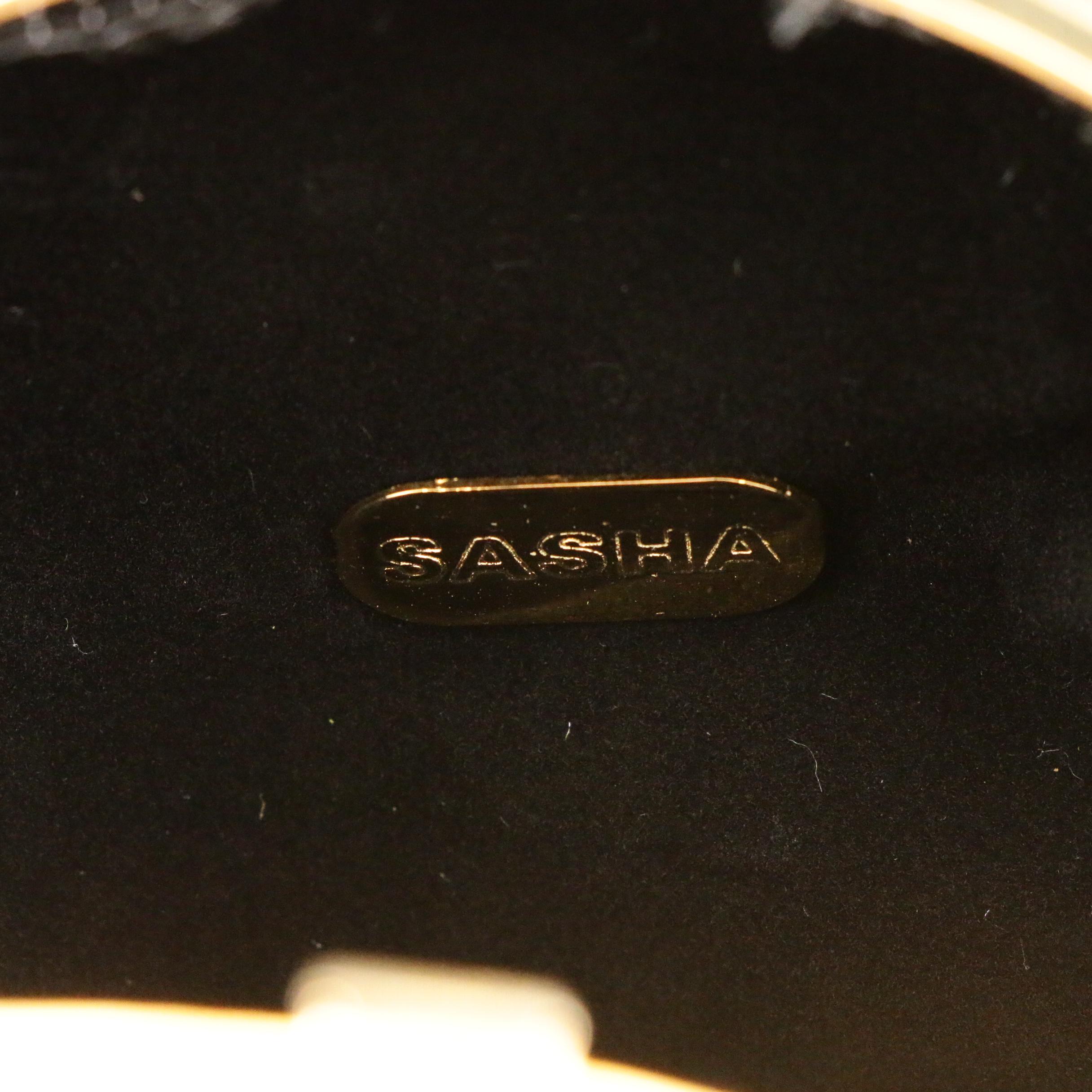 Sasha Evening Bag in Gold Tone Finish Depicting Dog Playing with Bejeweled Ball