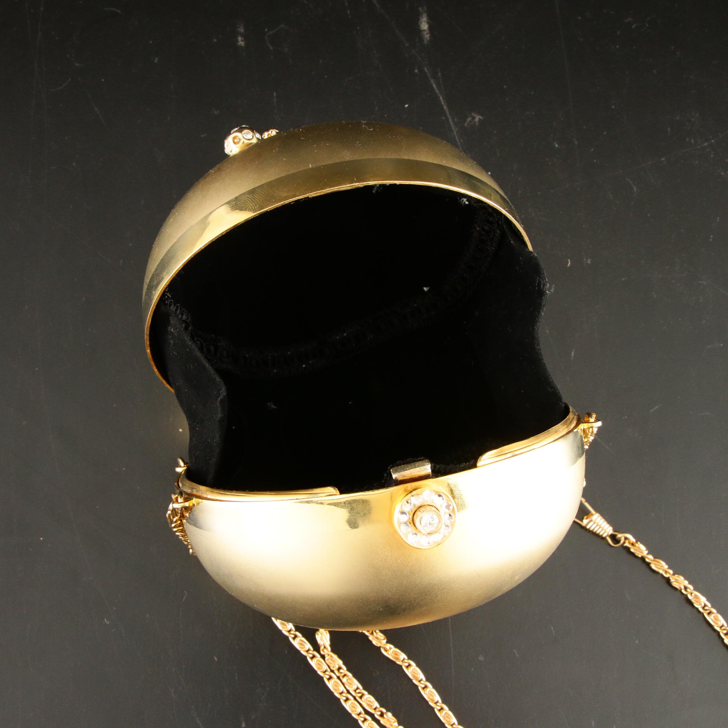 Sasha Evening Bag in Gold Tone Finish Depicting Dog Playing with Bejeweled Ball