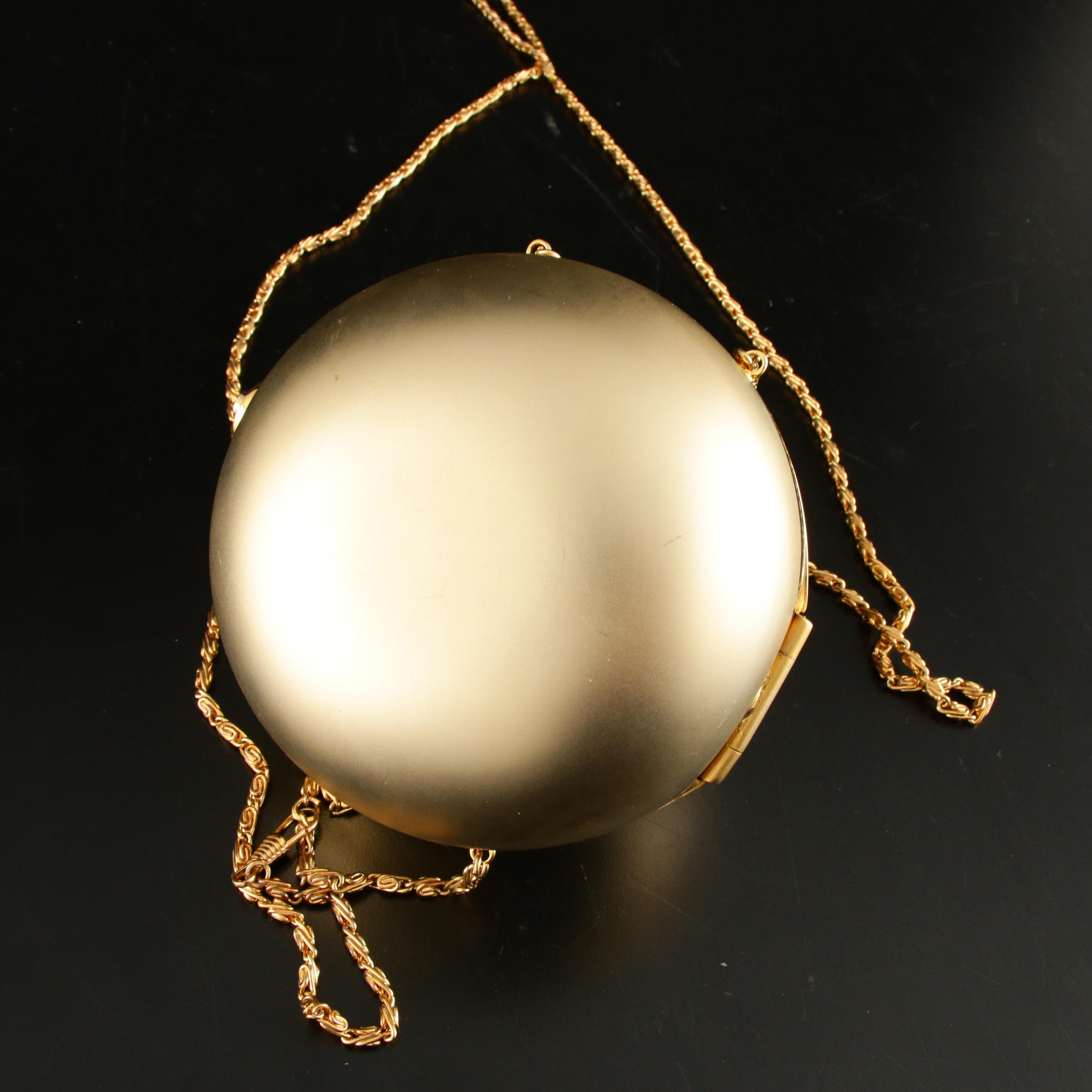 Sasha Evening Bag in Gold Tone Finish Depicting Dog Playing with Bejeweled Ball