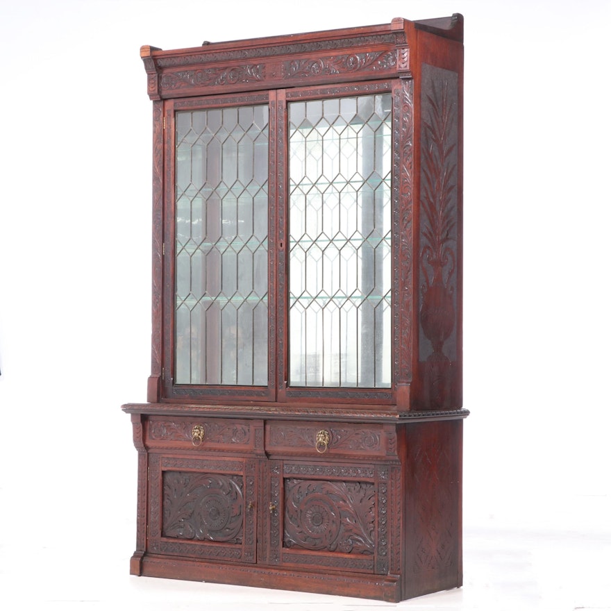 Cincinnati Art Carved Walnut and Leaded Glass Display Cabinet, dated 1890