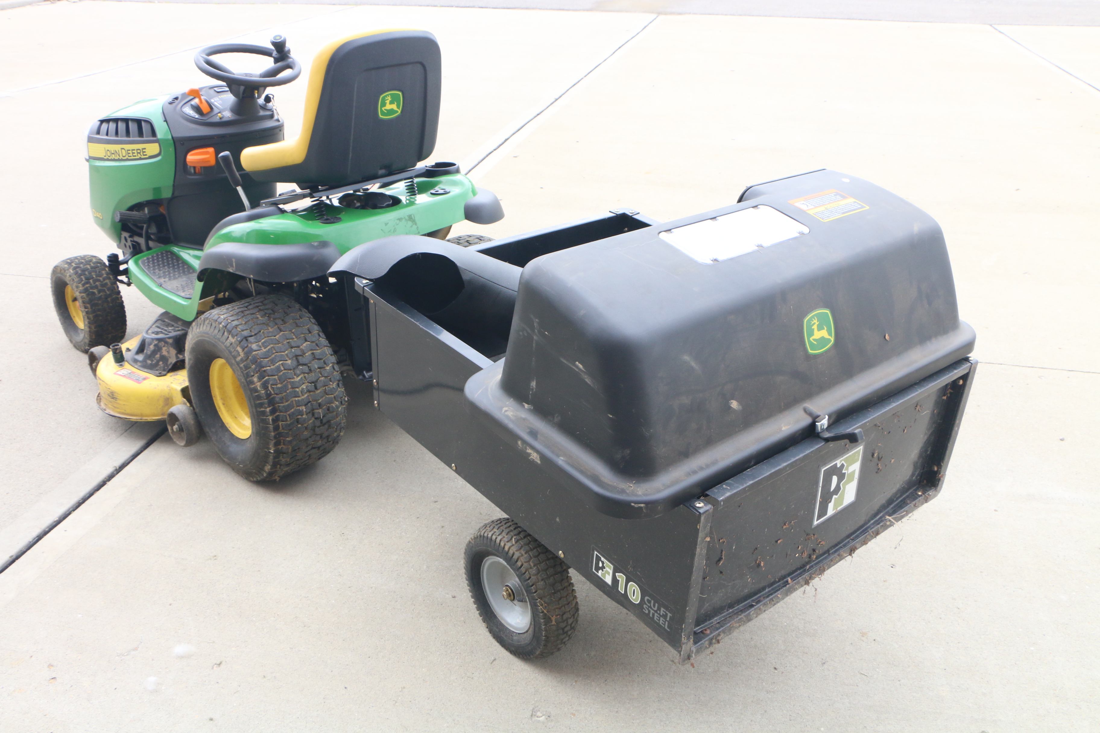 John Deere D140 Lawn Tractor with Tow Behind, Baggers and Side Vacuum Hose