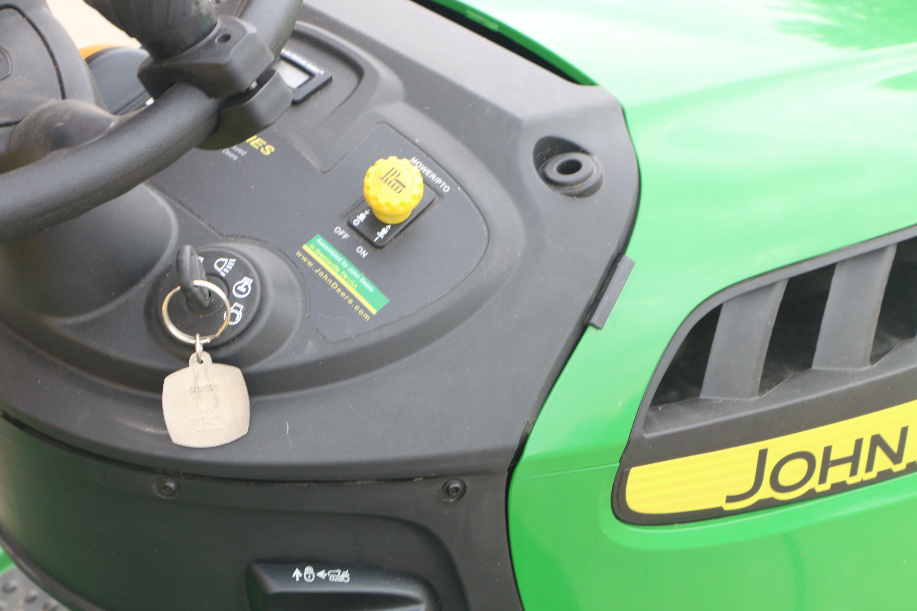 John Deere D140 Lawn Tractor with Tow Behind, Baggers and Side Vacuum Hose