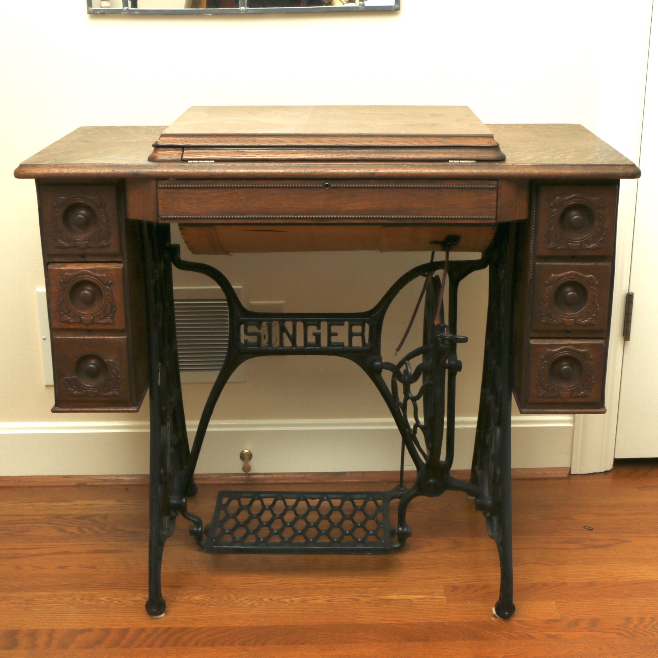 Singer Manufacturing Co. Sewing Machine in Oak Cabinet, Iron Treadle Base, 1919