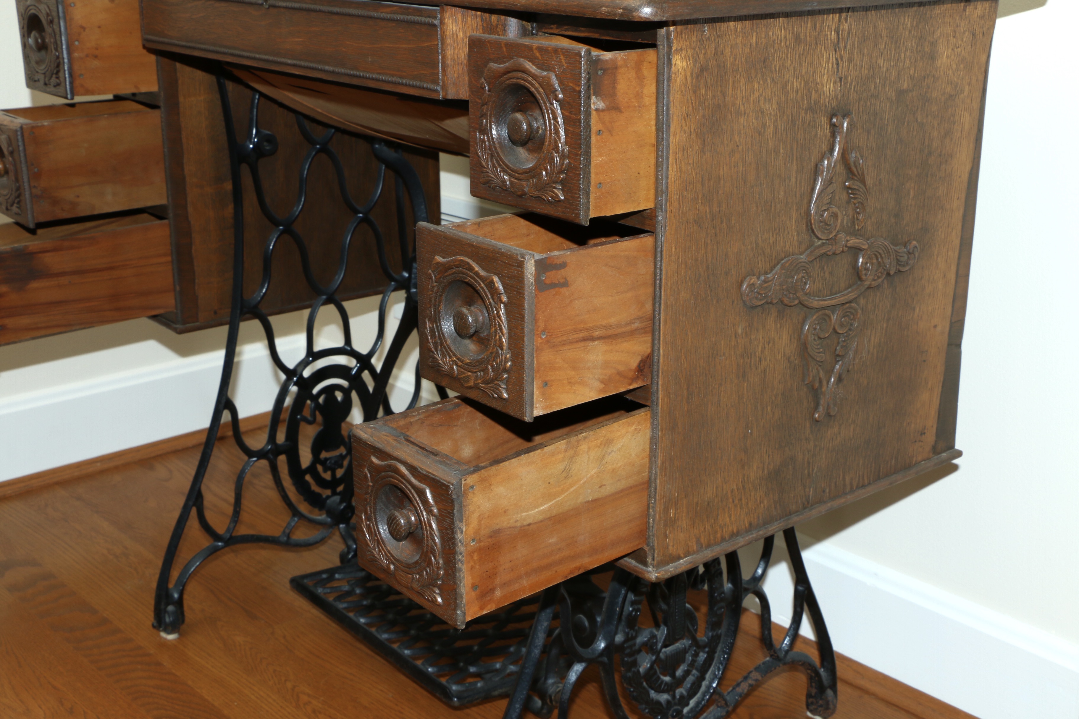 Singer Manufacturing Co. Sewing Machine in Oak Cabinet, Iron Treadle Base, 1919
