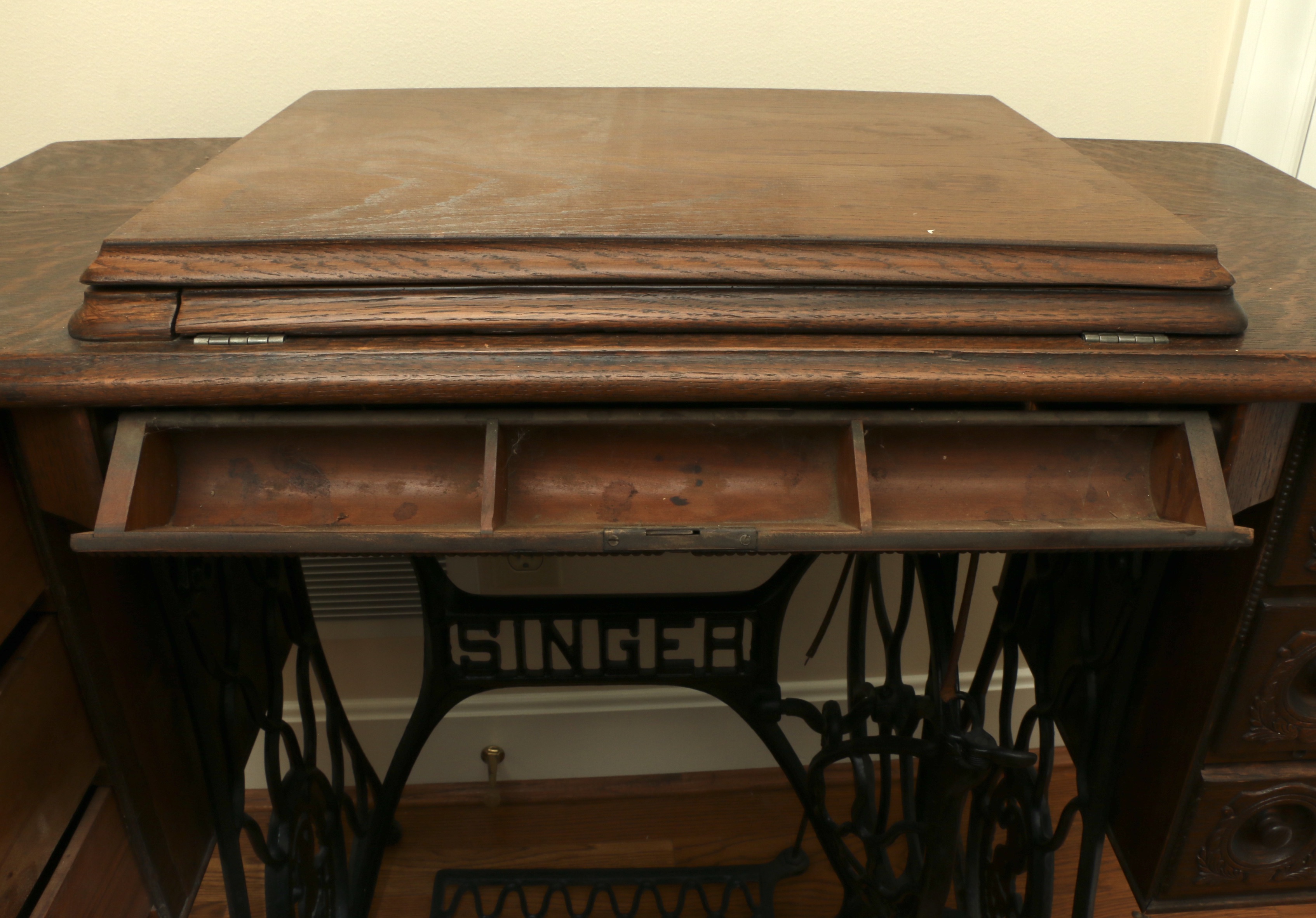 Singer Manufacturing Co. Sewing Machine in Oak Cabinet, Iron Treadle Base, 1919
