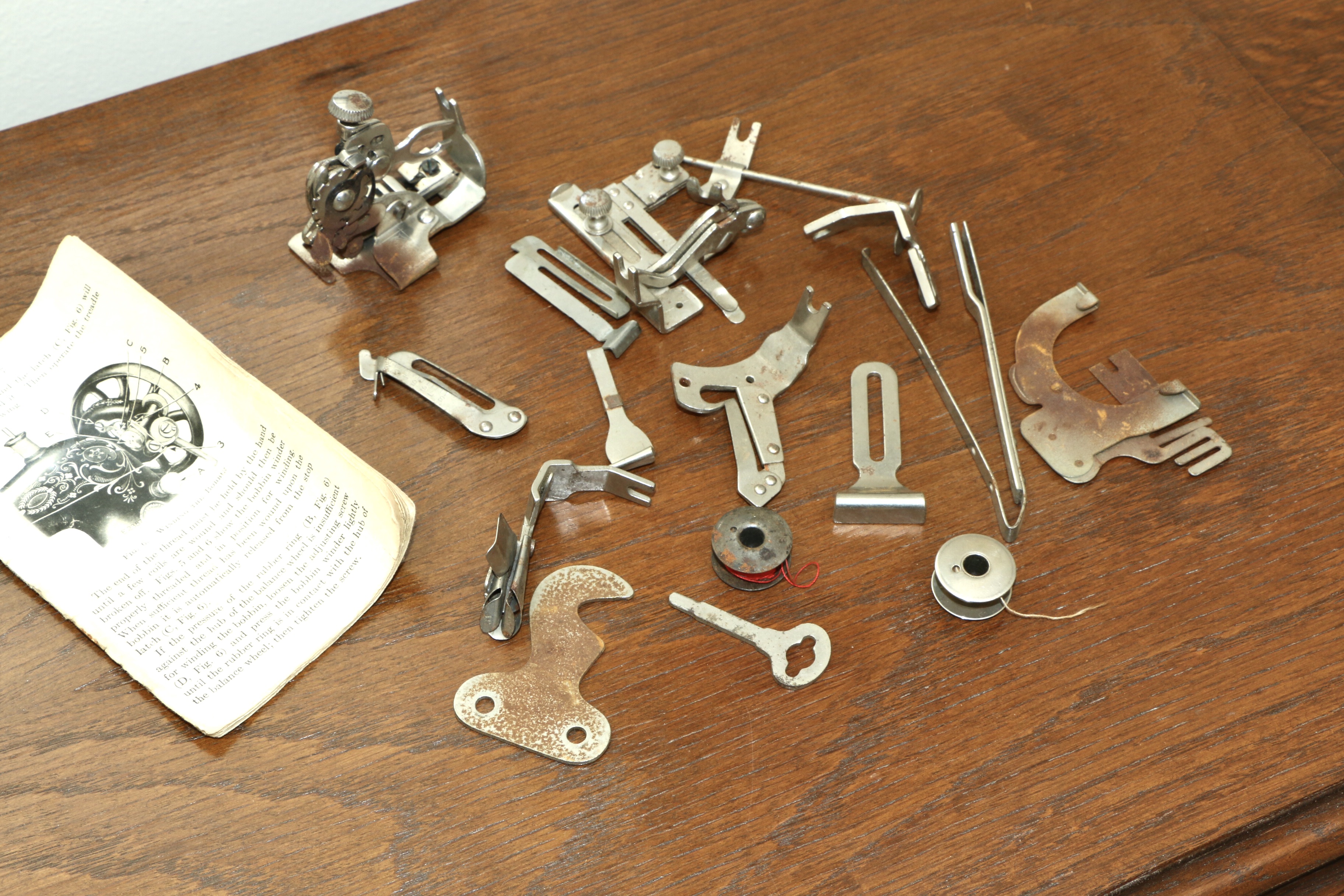 Singer Manufacturing Co. Sewing Machine in Oak Cabinet, Iron Treadle Base, 1919