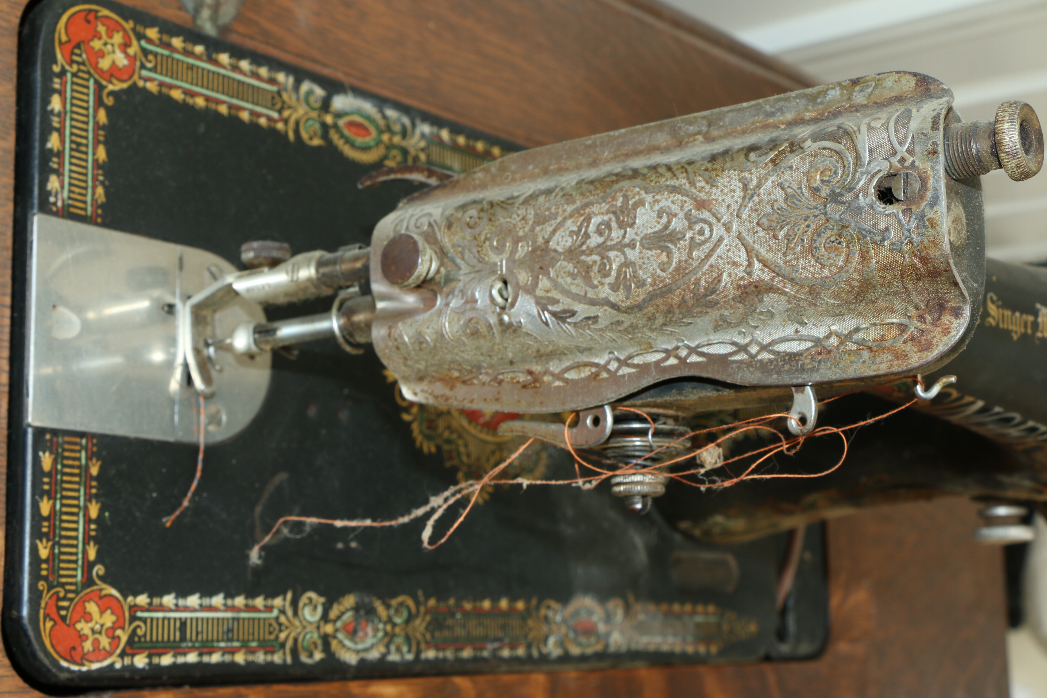 Singer Manufacturing Co. Sewing Machine in Oak Cabinet, Iron Treadle Base, 1919