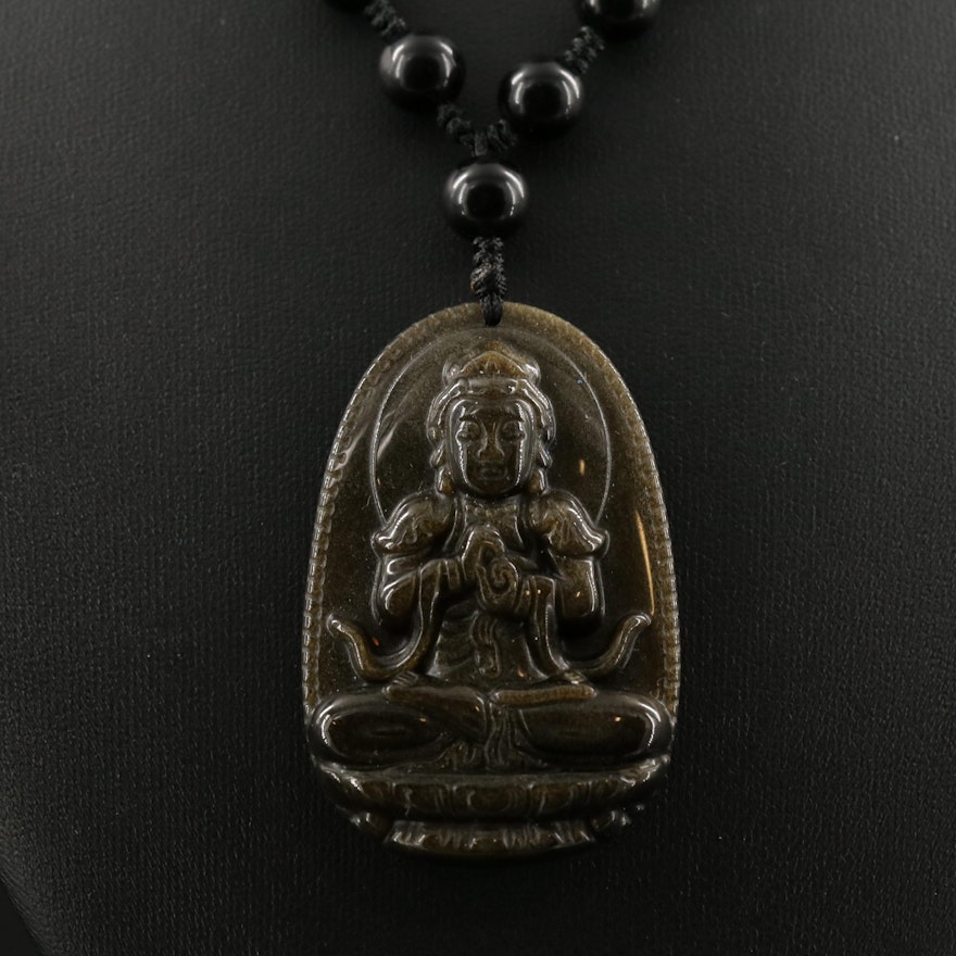 Sheen Obsidian Necklace Featuring Buddha with Hands Lifted in Dharmachakra Murda