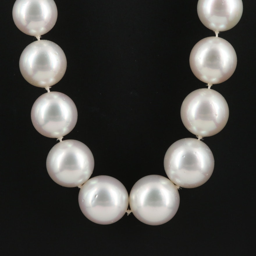 Strand of Pearls with 18K Gypsy Set Diamond Accented Clasp