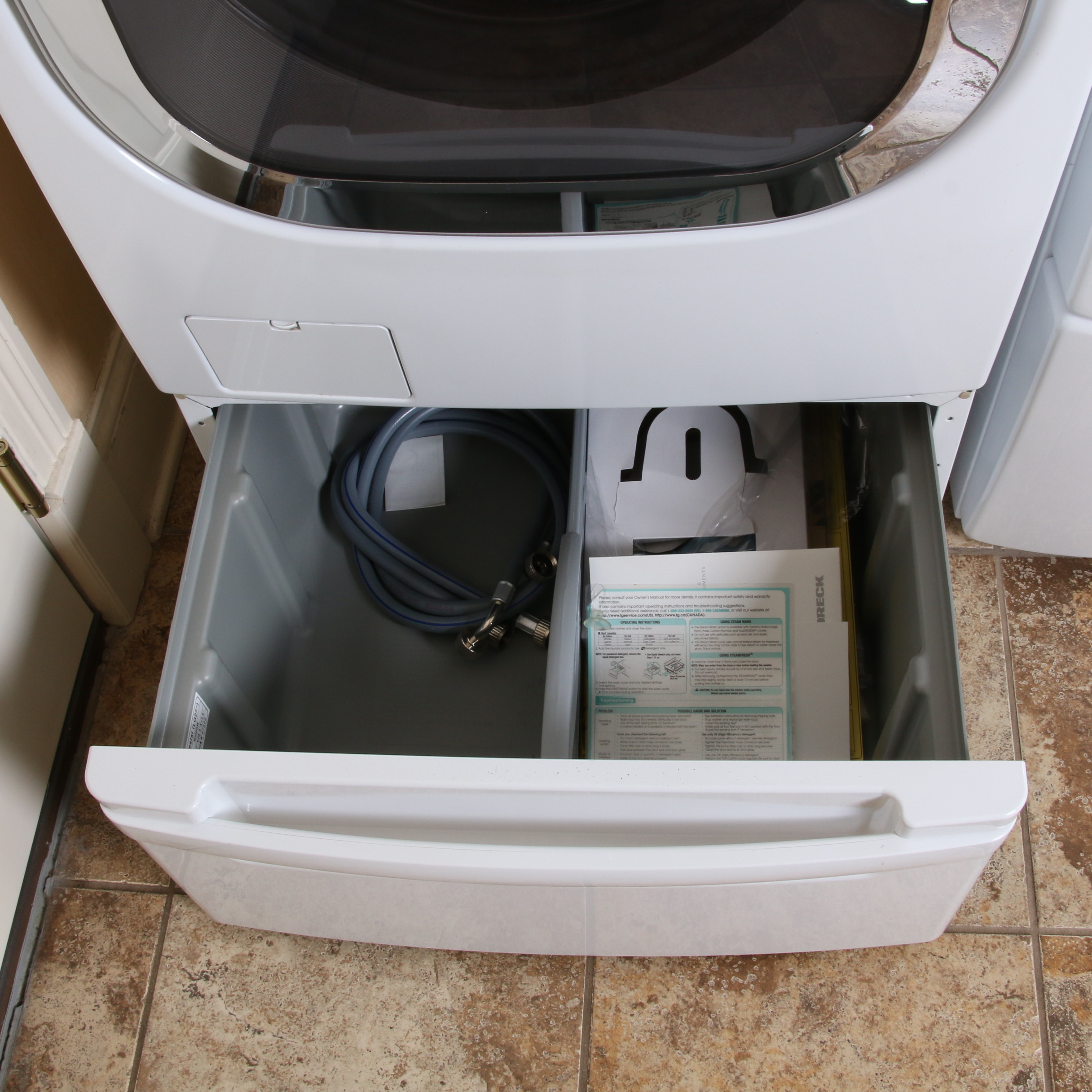 LG True Steam Front Load Washer with Drawer Stand