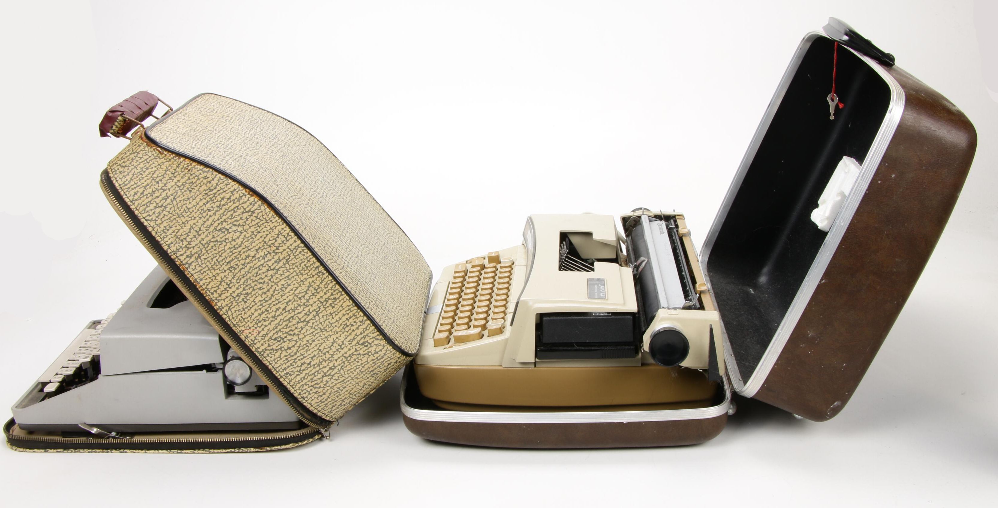 Remington "Monarch" and Smith-Corona Coronet "Super 12" Portable Typewriters
